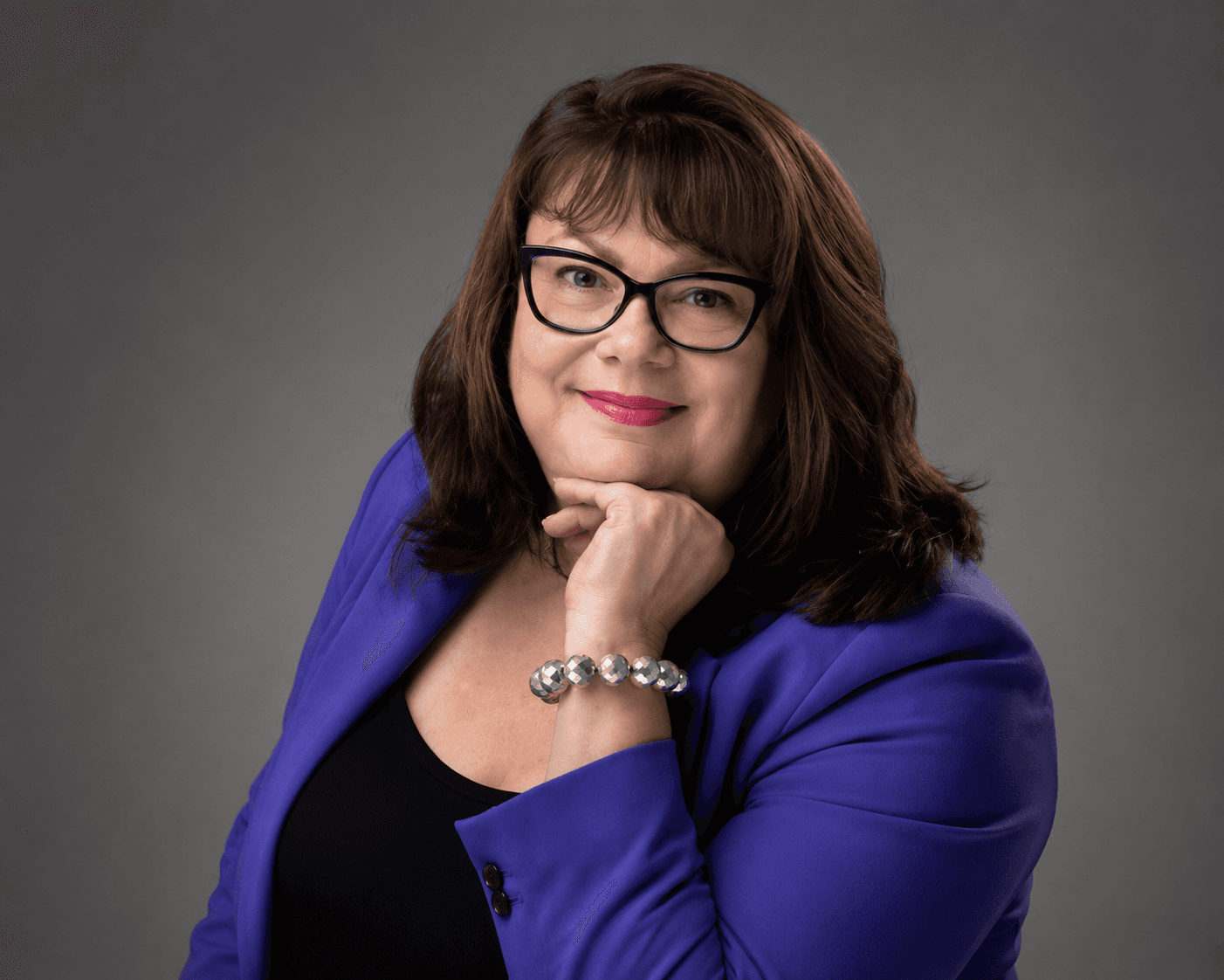 Portrait of Christine Johnson, Realtor Partner at UR-SPACE Calgary, helping clients explore modern backyard suite and property value opportunities.