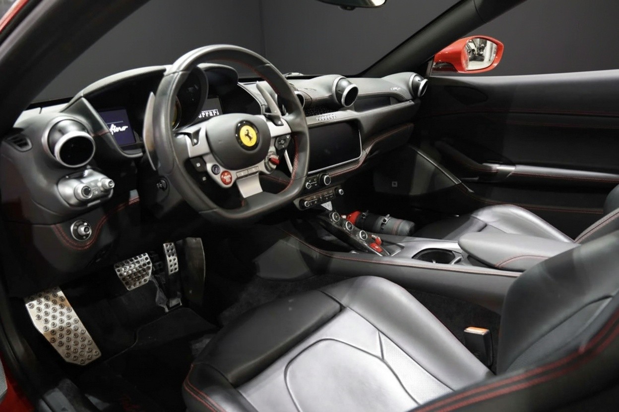 Ferrari Portofino interior with premium leather and digital cockpit for luxury car rental in Dubai