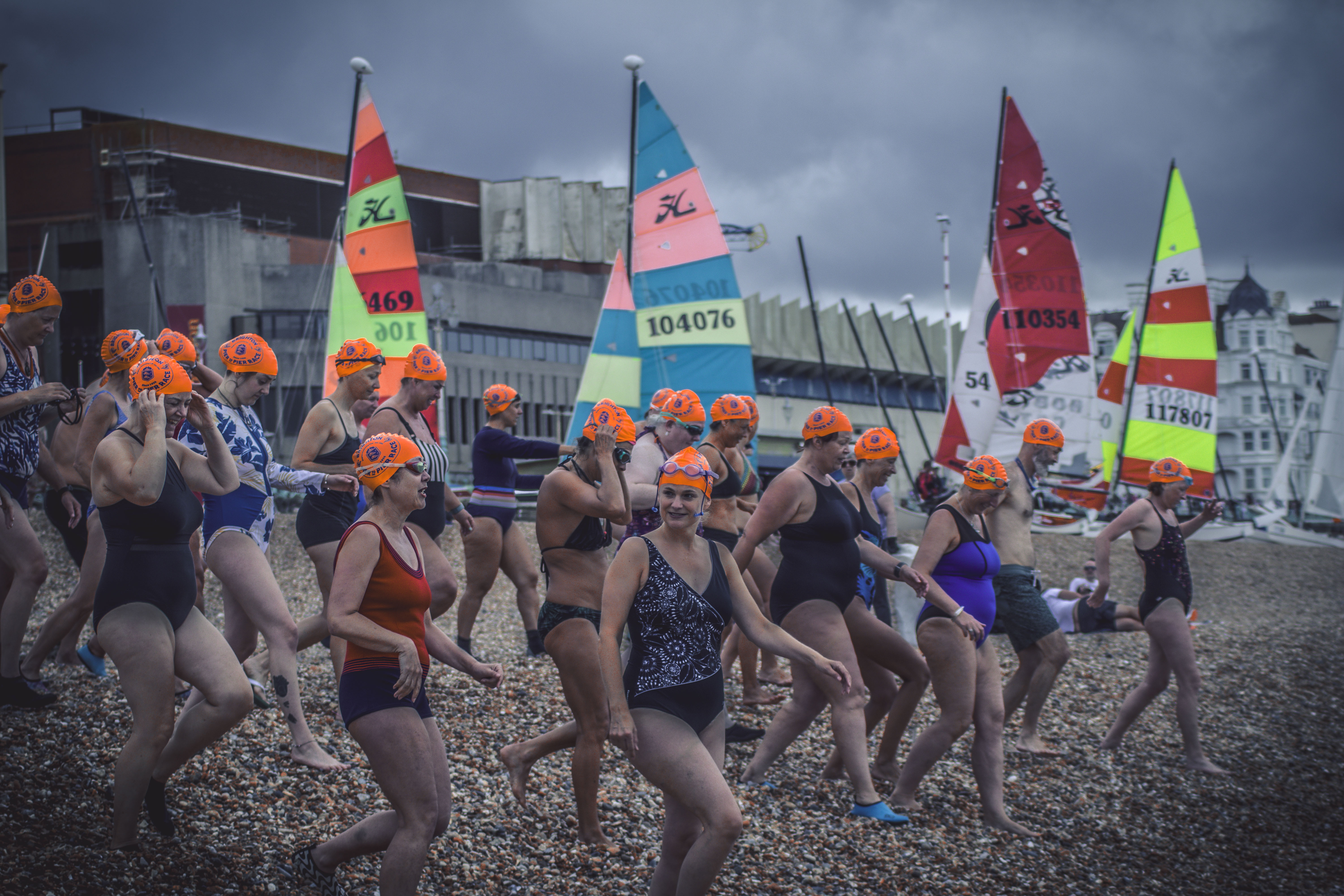 two people looking at a tablet and smiling