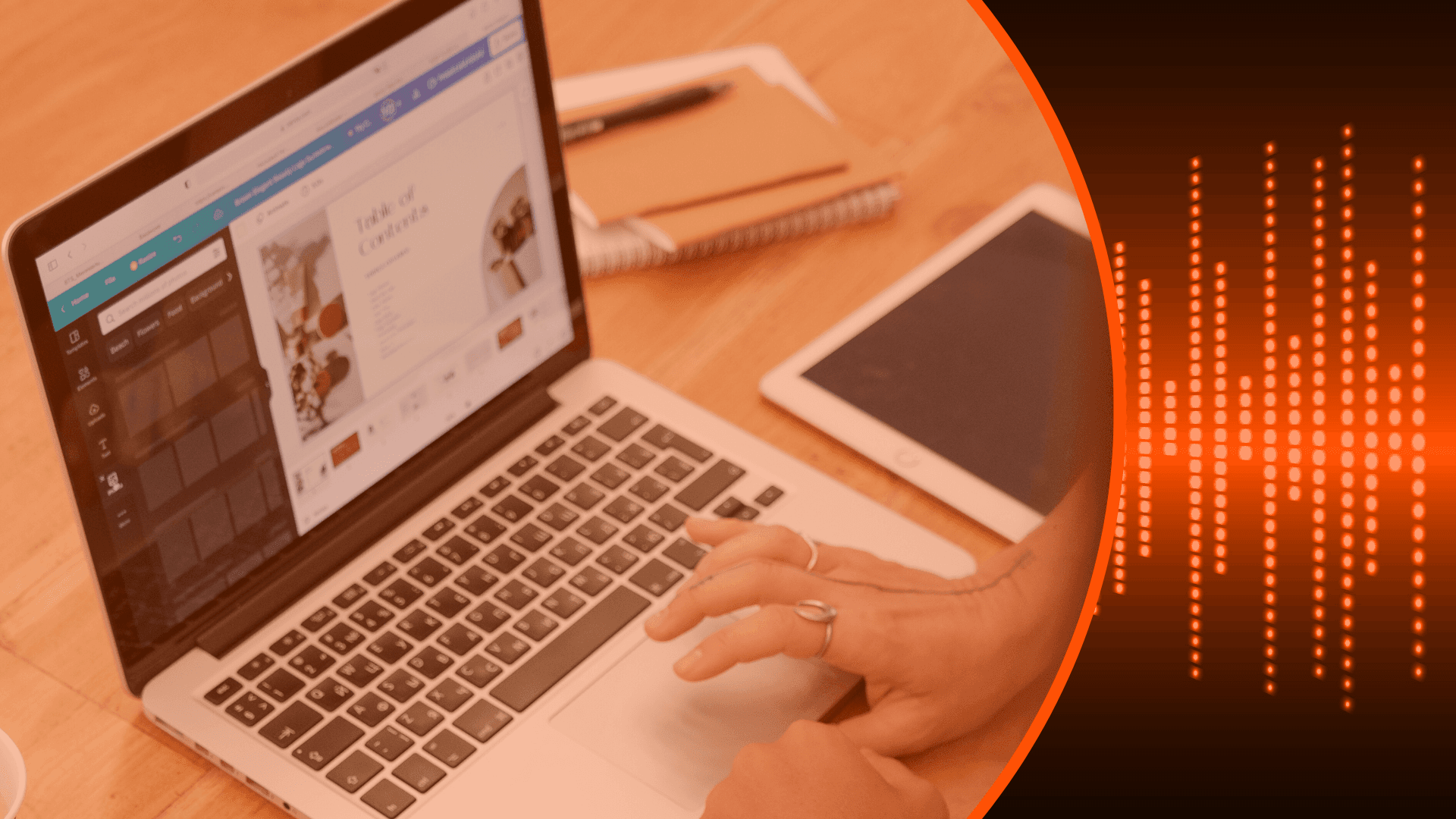 Person typing on laptop near tablet -  How to Repurpose Webinar Content for Marketing 