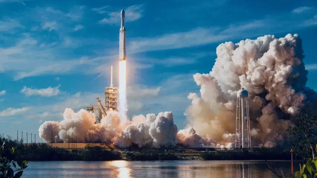 SpaceX rocket launches with massive exhaust plumes, illustrating vision meeting execution.