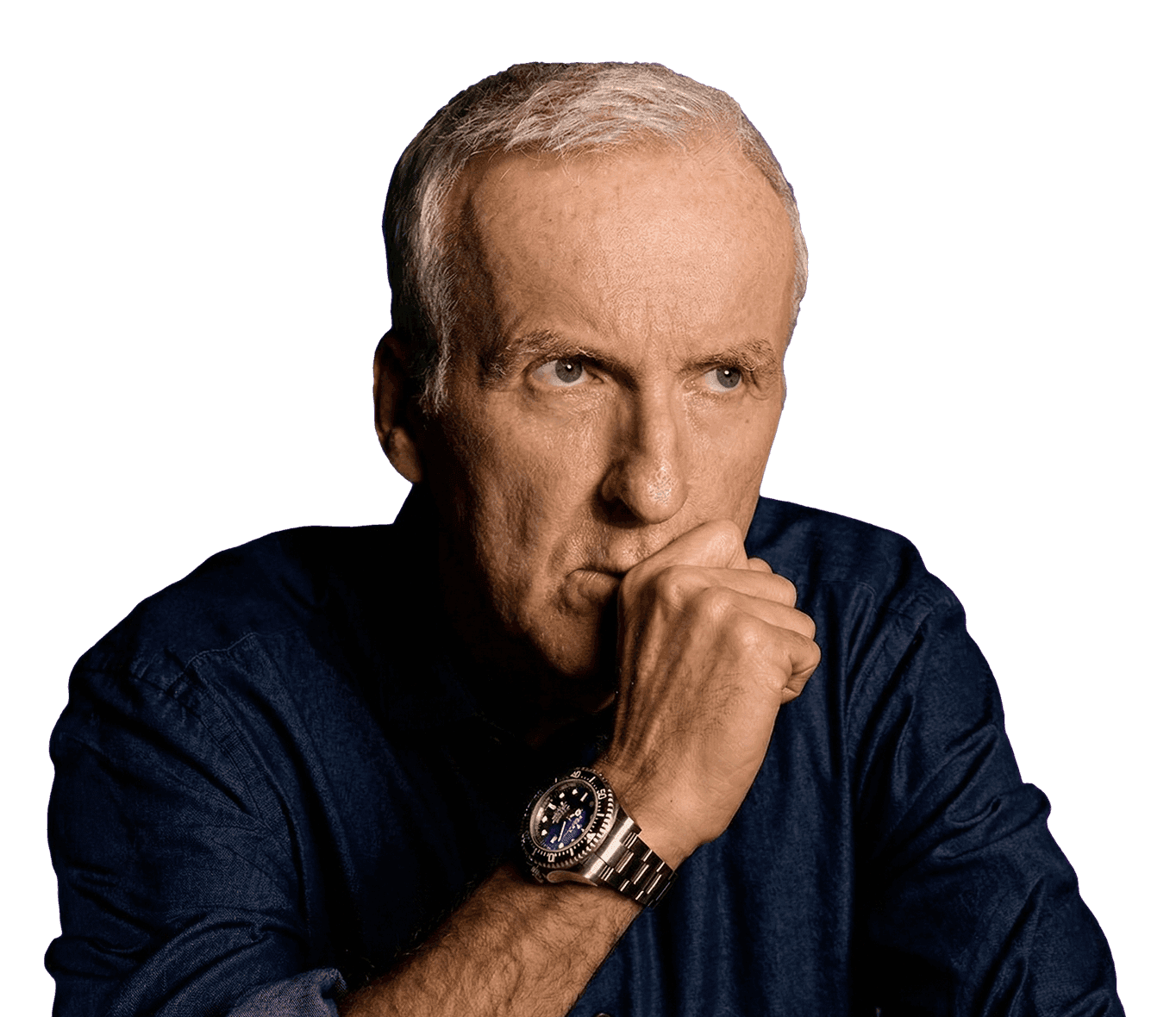 A confident person with short, styled hair and a leather jacket poses against a dark backdrop.