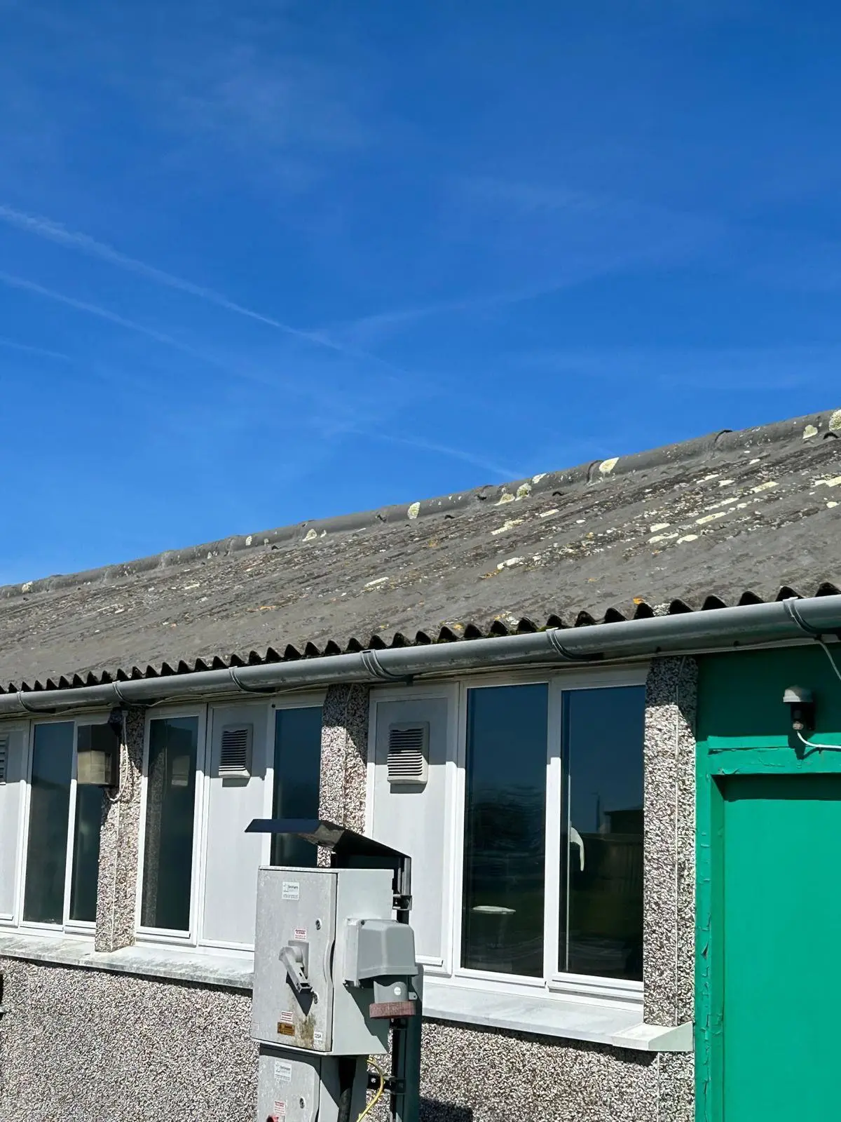 asbestos roof not insulated with spray foam