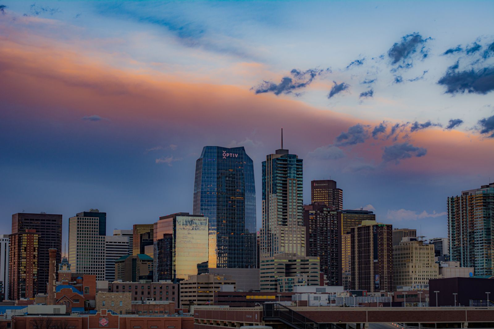 Downtown Denver skyline under a colourful sunset sky
