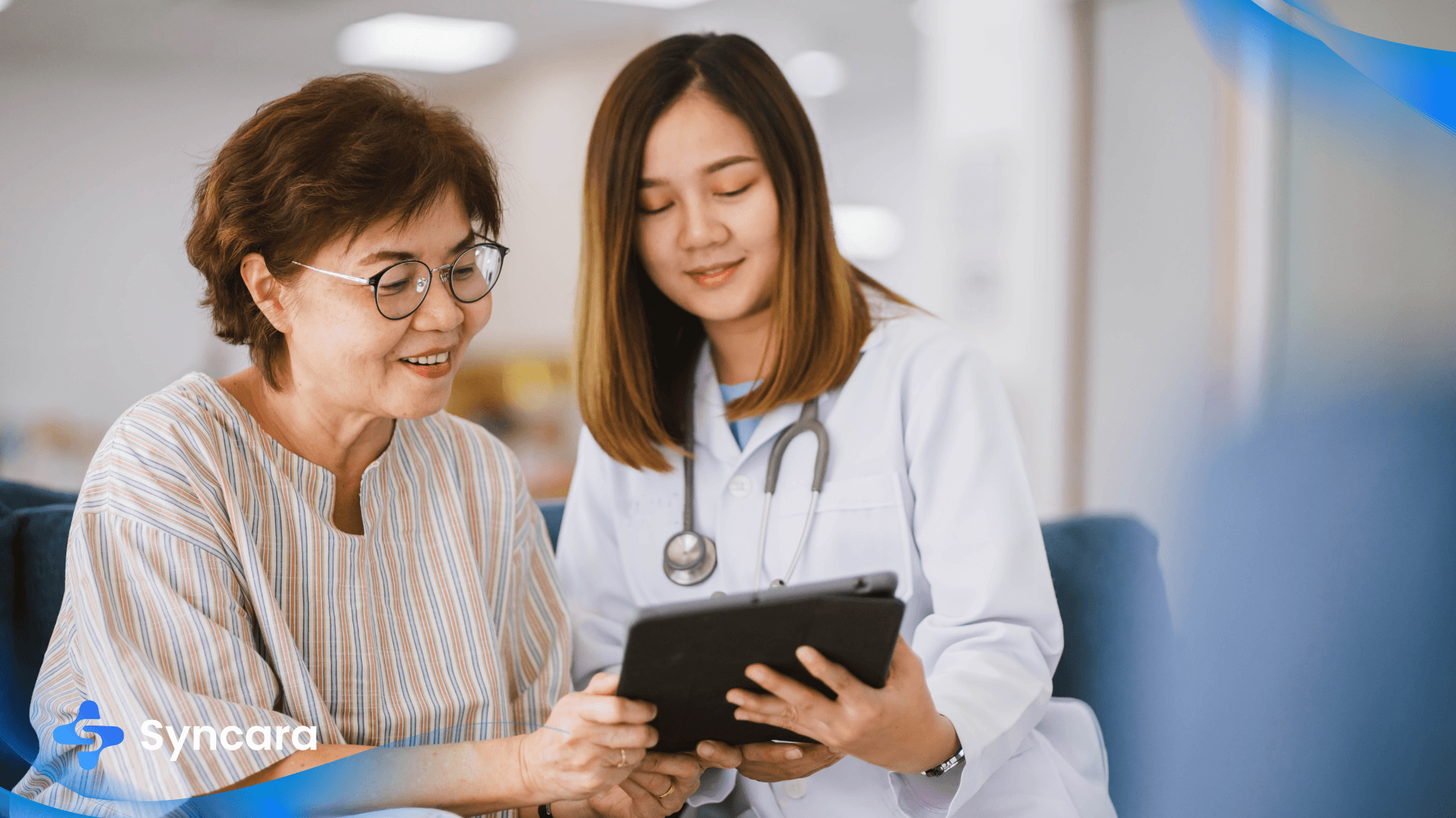 Family doctor in Markham engaged in a conversation with a patient.