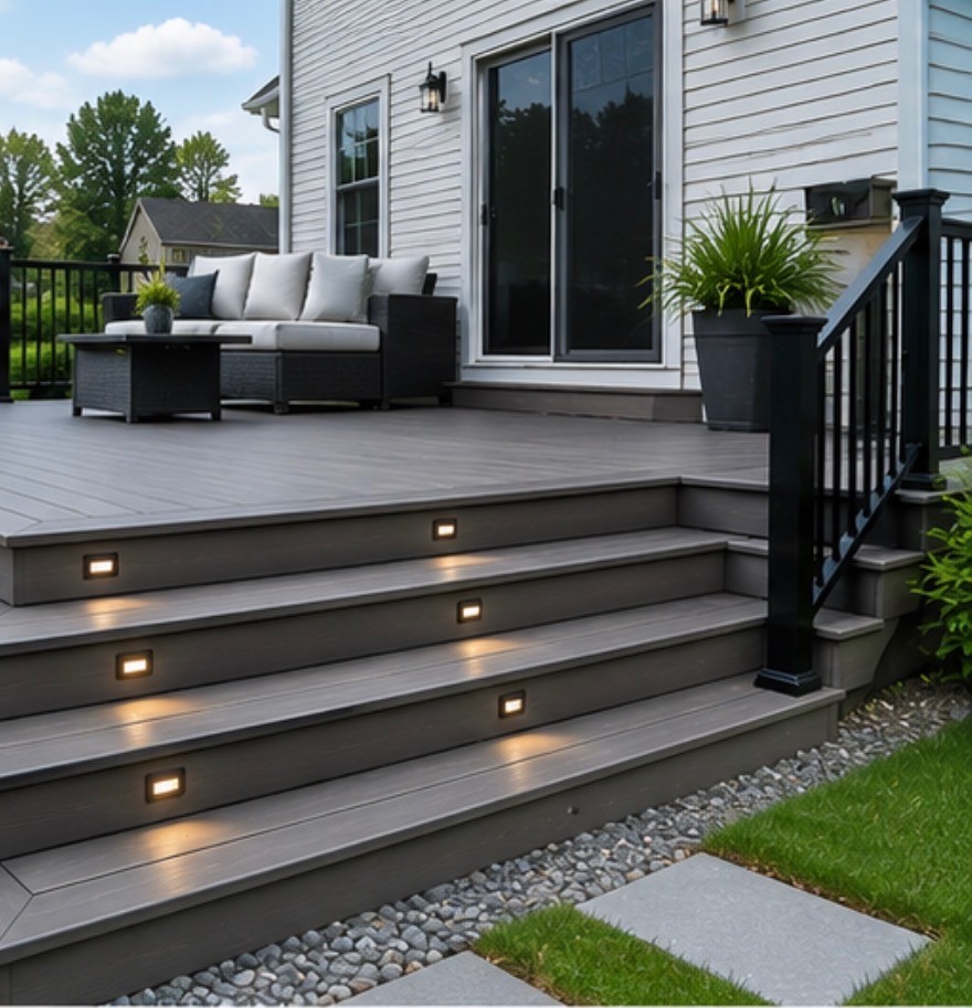 Finished backyard deck with seating and railing