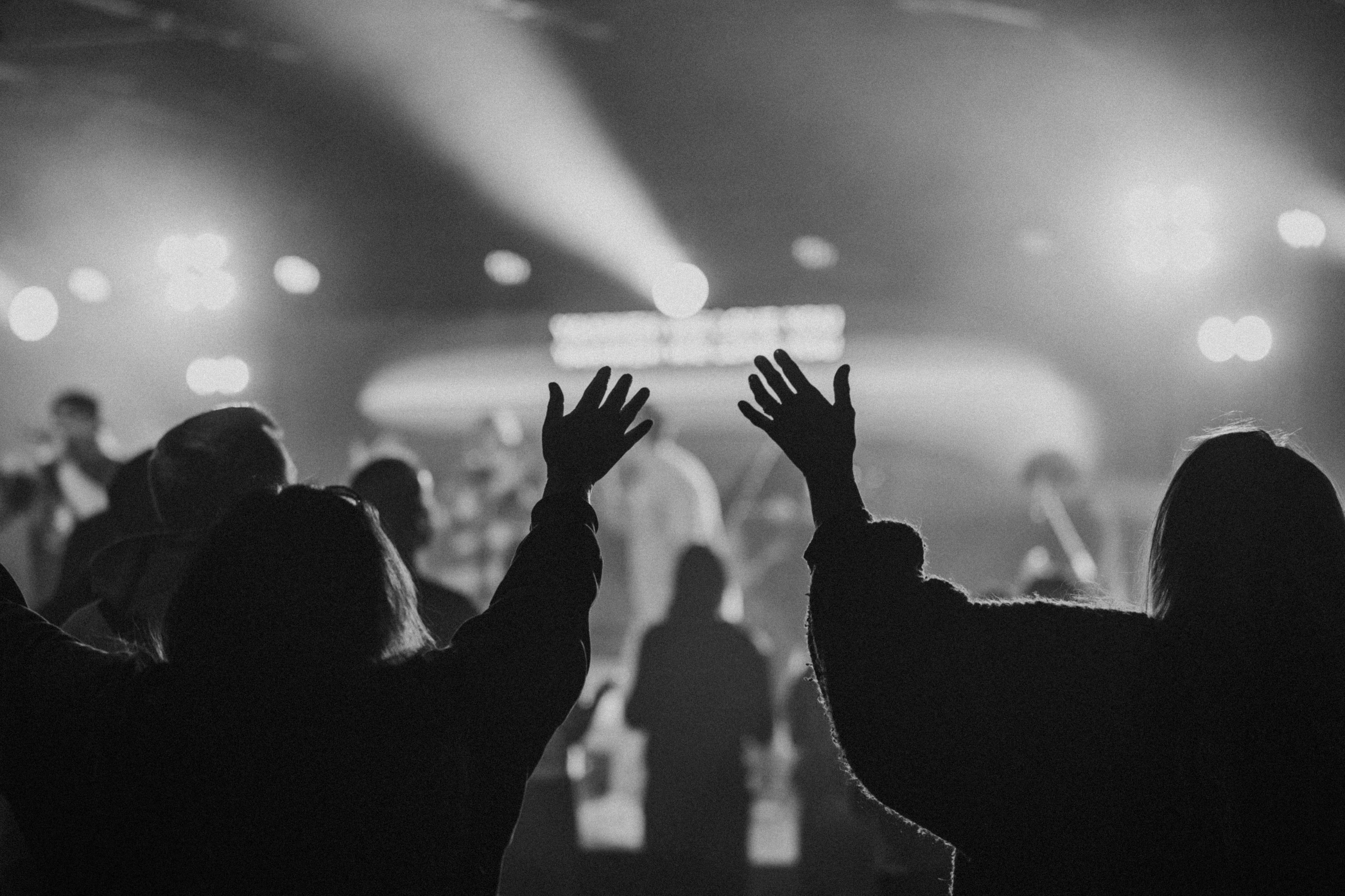 Photo of a man shooting a gun at our annual christian mens conference.