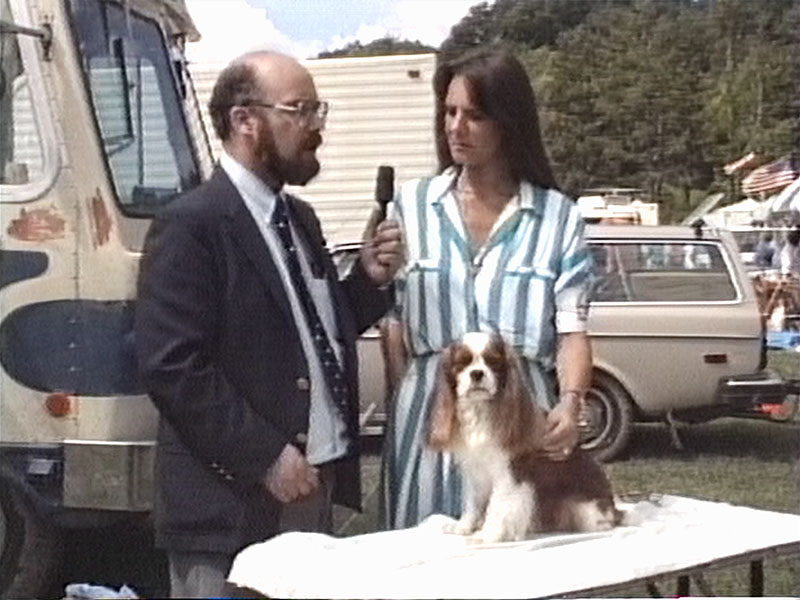 Sincerely, Ric still - Ric Interviewing dog handler