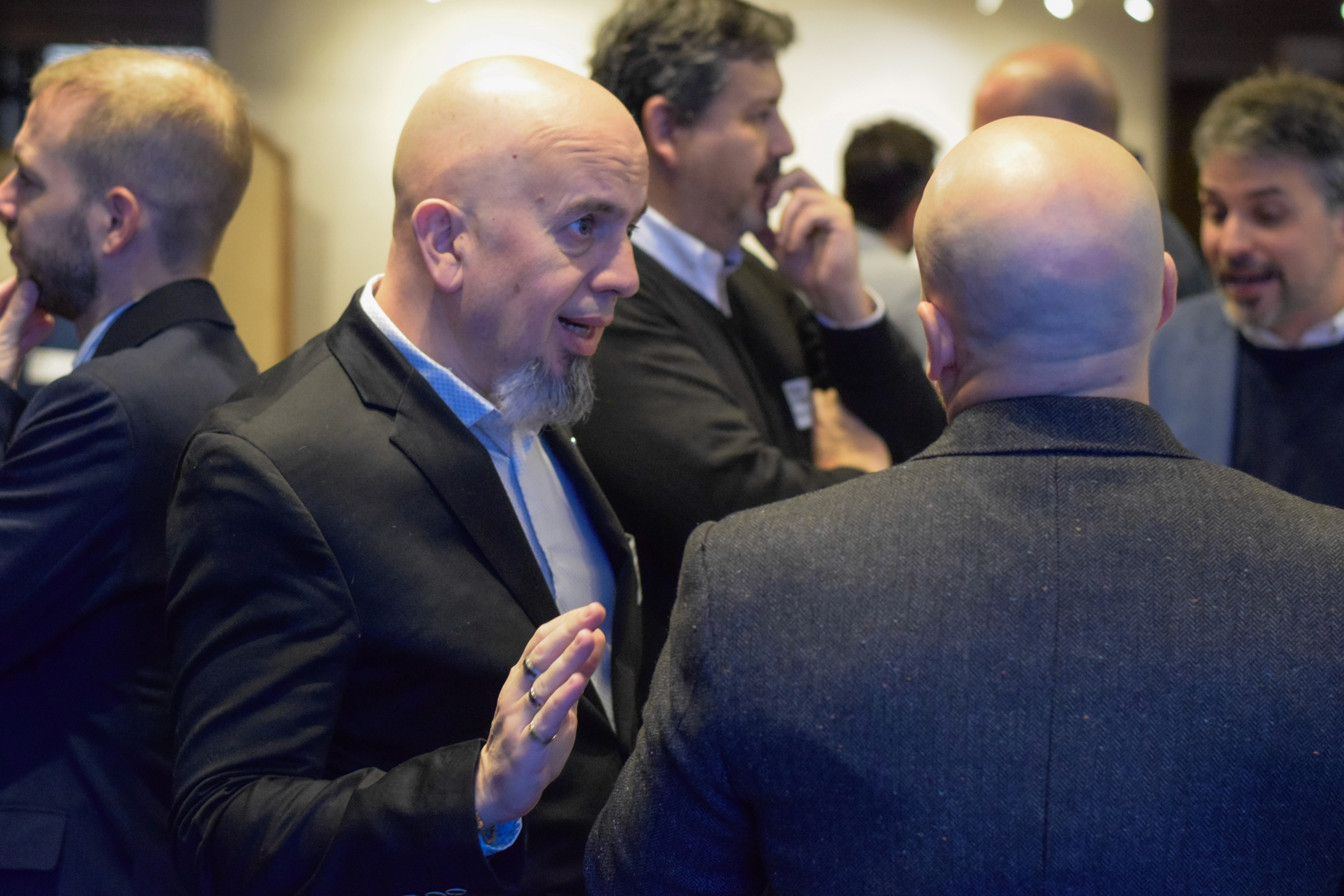 Woman talking to a Man using Mic