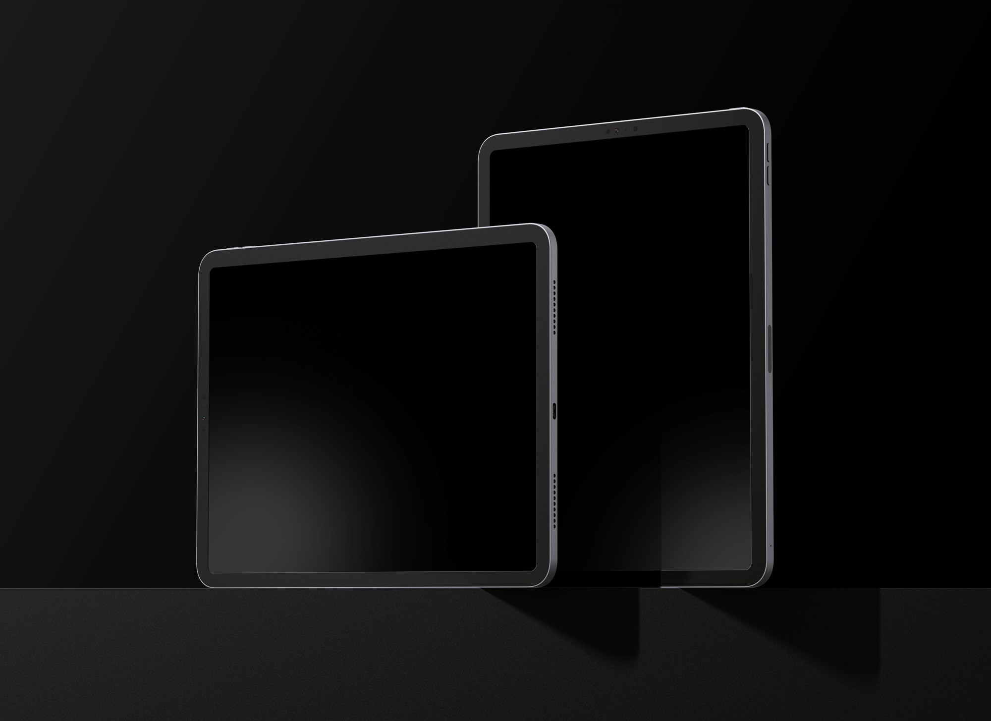 Black tablet screens stacked