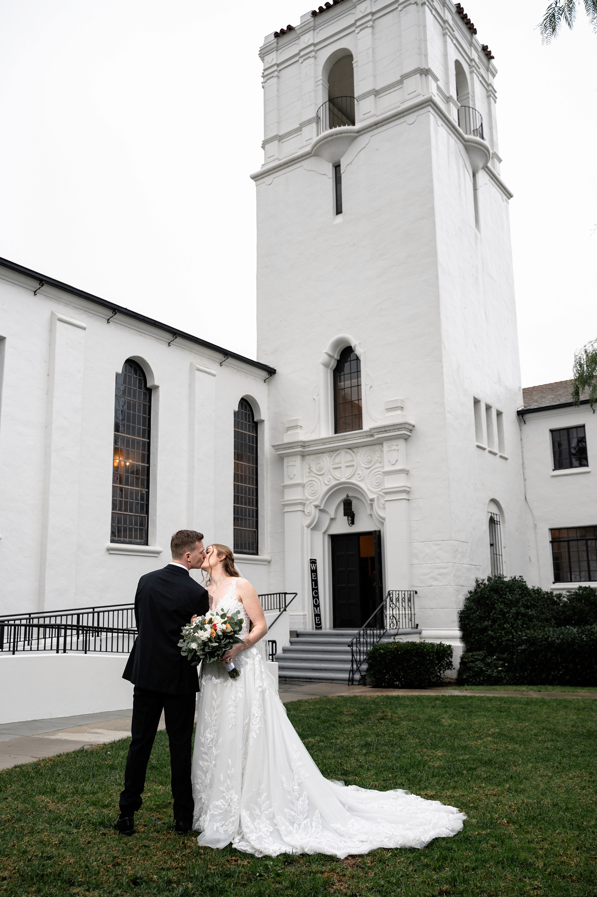 Flat lay wedding details with bouquet, rings, and sparkling bridal heels