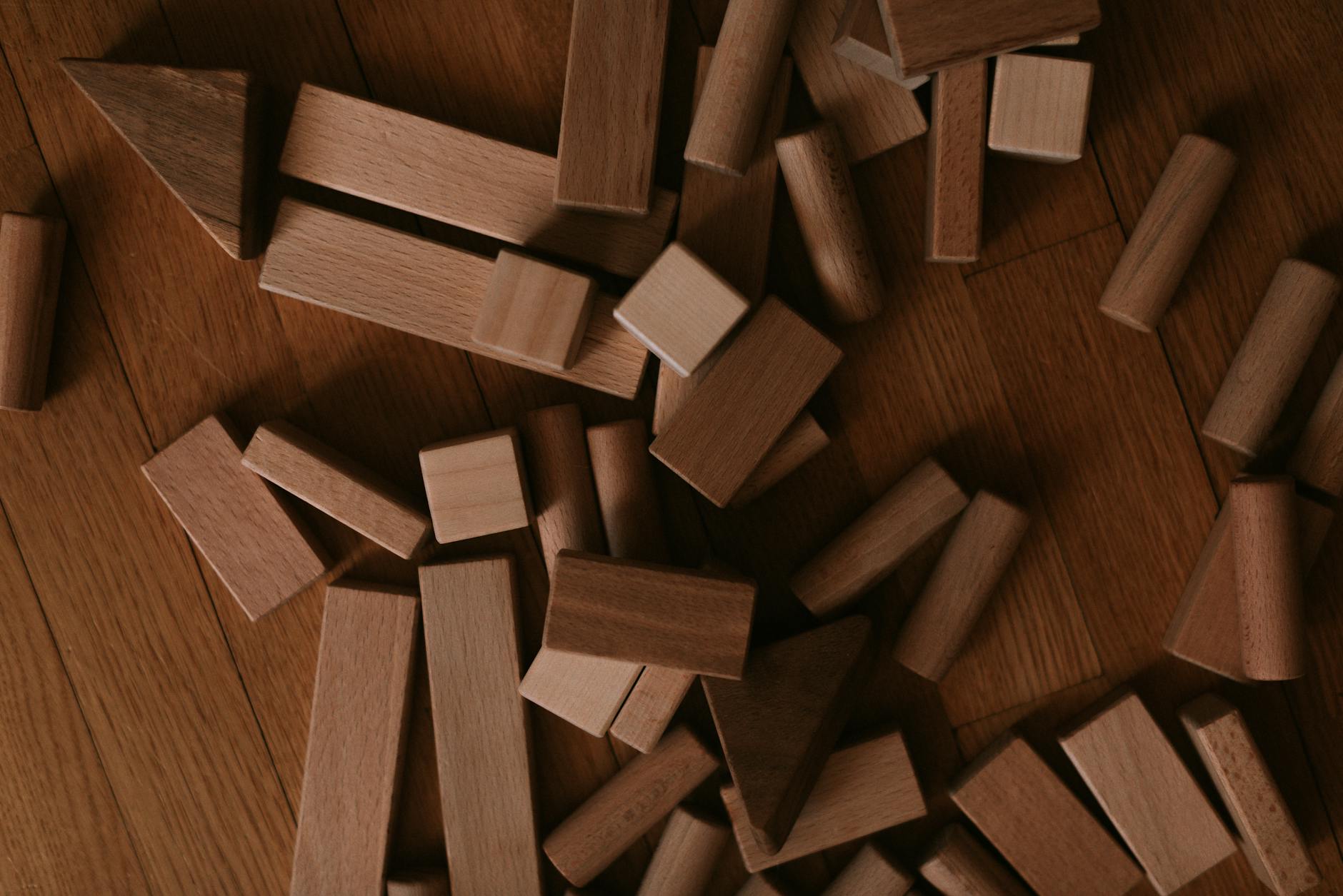 A teacher standing at a whiteboard using a flowchart to explain a complex biological process to the class.