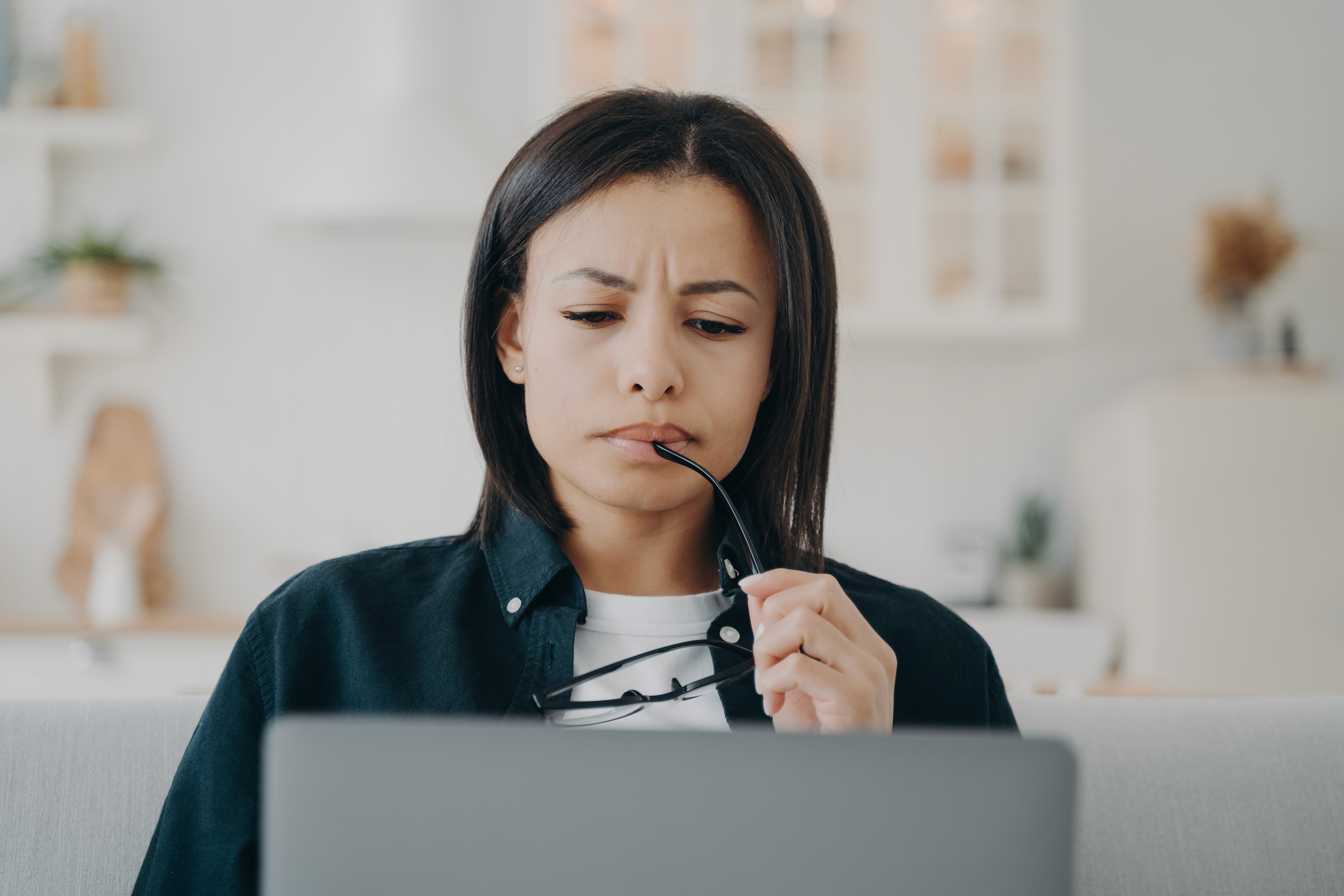 Business leader reviewing disconnected marketing and revenue data without the AI analytics, AI marketing, and AI-driven marketing automation needed for clear commercial insight.