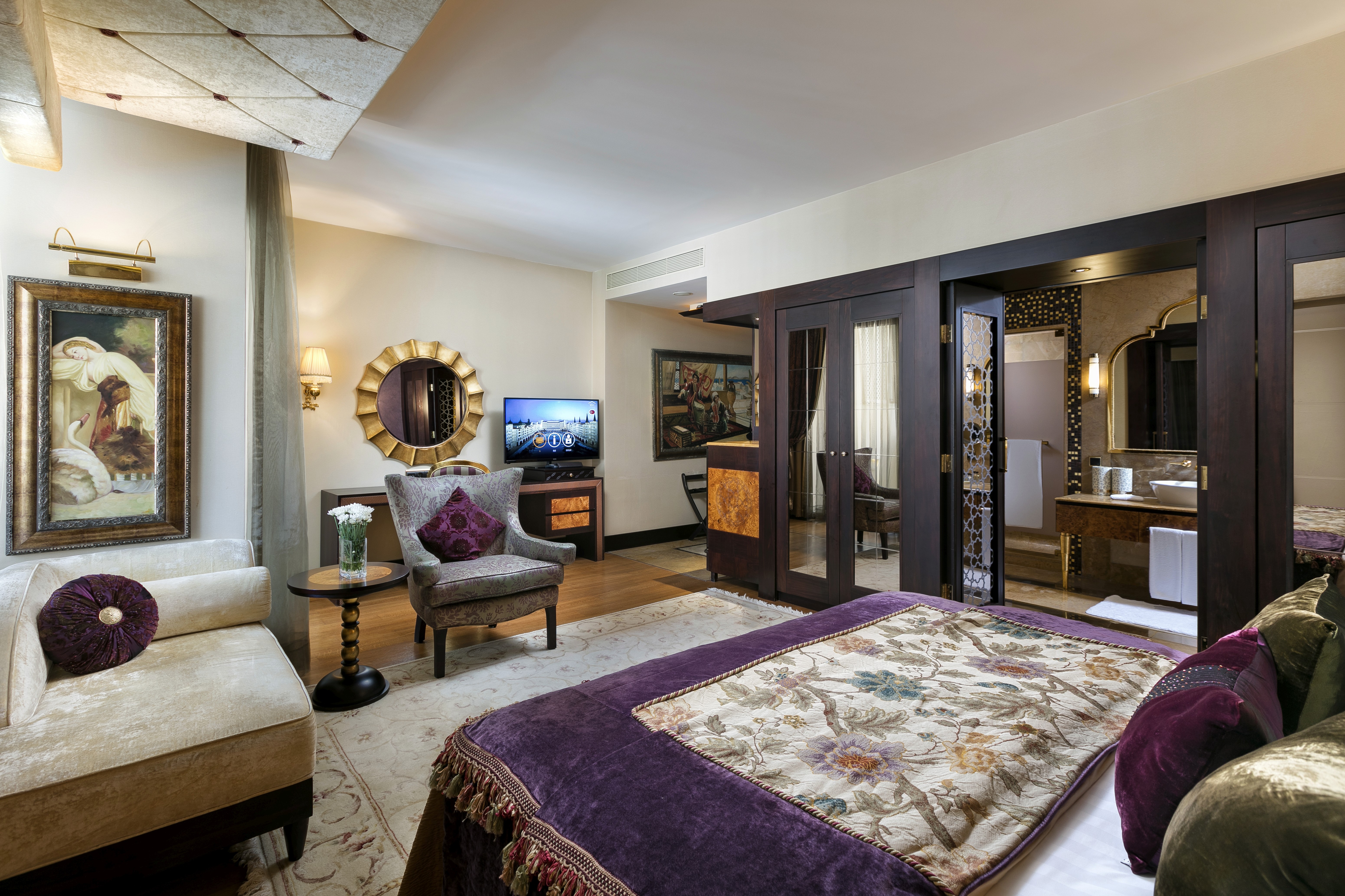 Comfortable seating area with elegant décor, flat-screen TV, and thoughtfully designed living space.