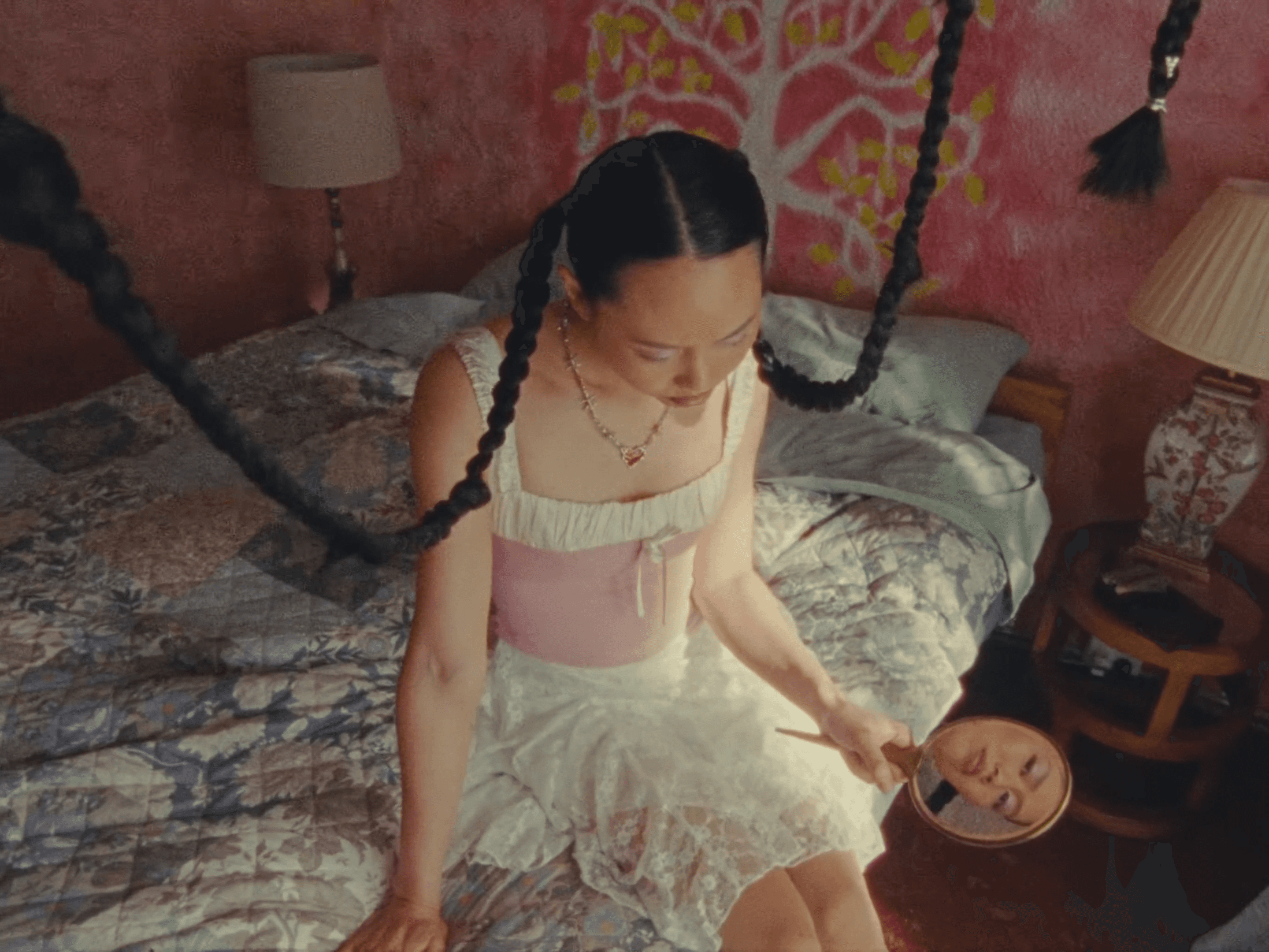 Lush green conical mountains under a hazy sky