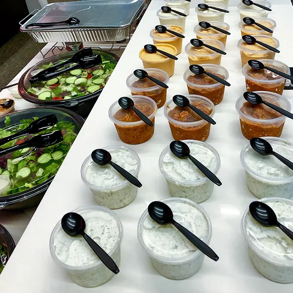     Cafe Izmir dips and salads prepared for catering