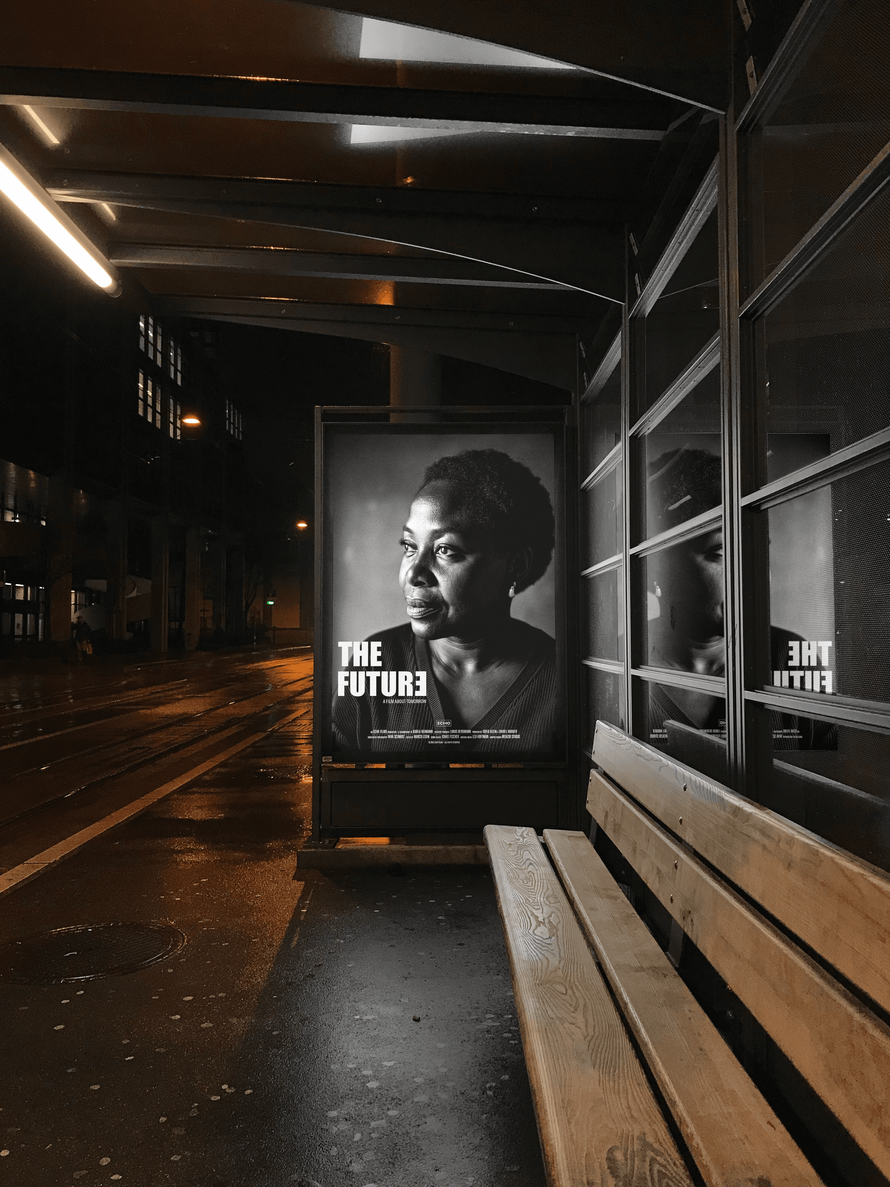 Echo Films visual identity applied to a digital bus stop screen — poster design reflecting narrative clarity and monochrome styling.
