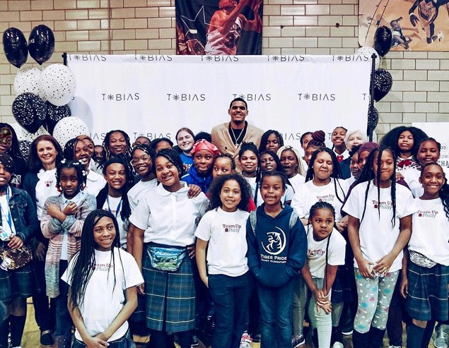 Photographer holding camera