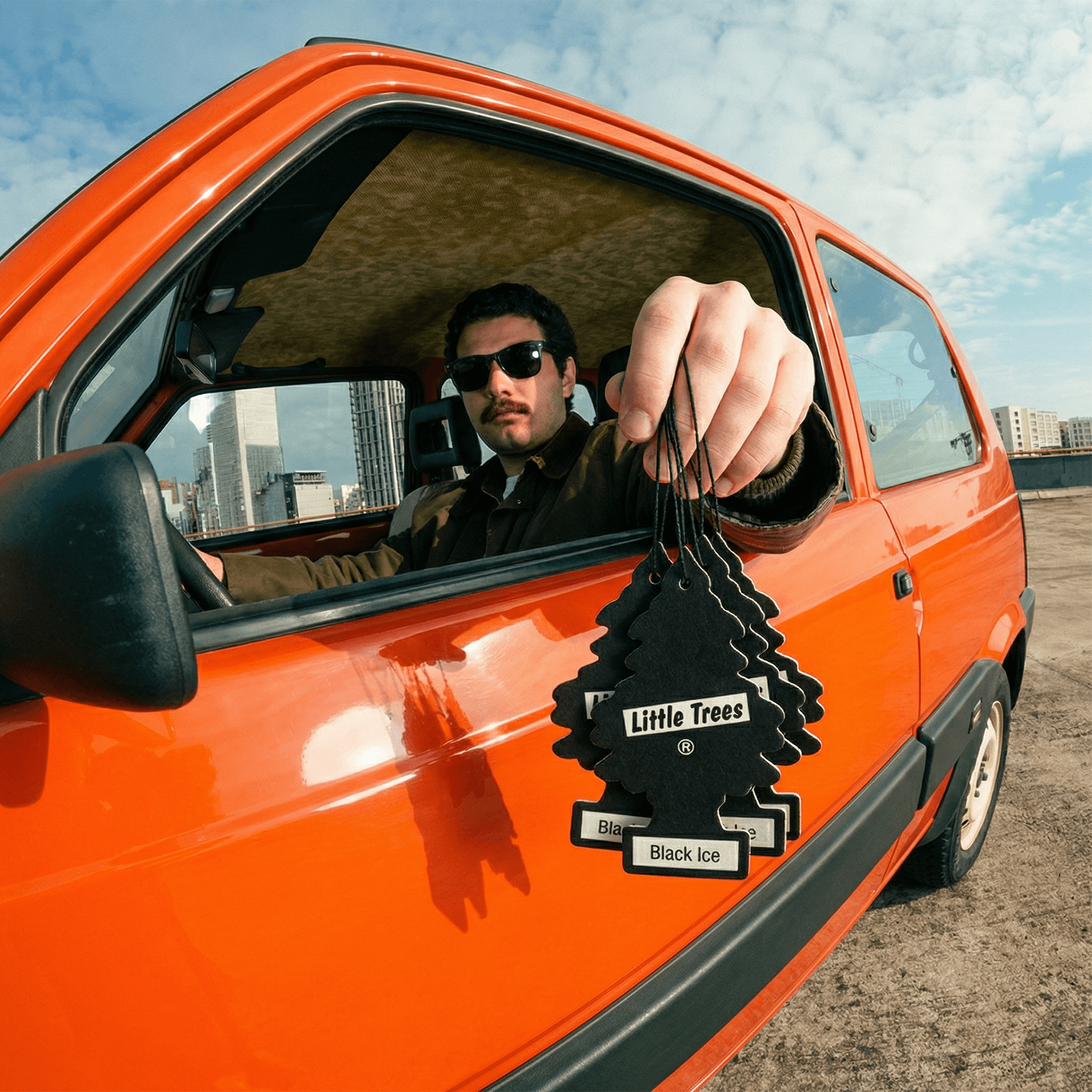 orange car air freshner