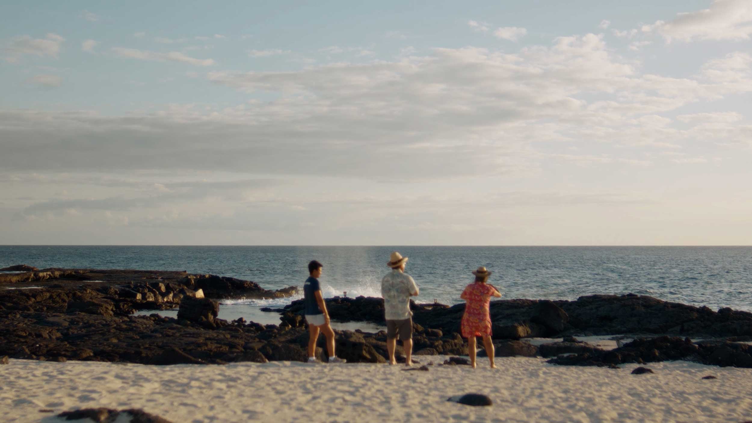 Streetside billboard with flyposters of the Batch.Works brand and illustrations