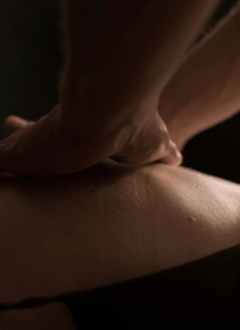 Closeup of hands massaging skin