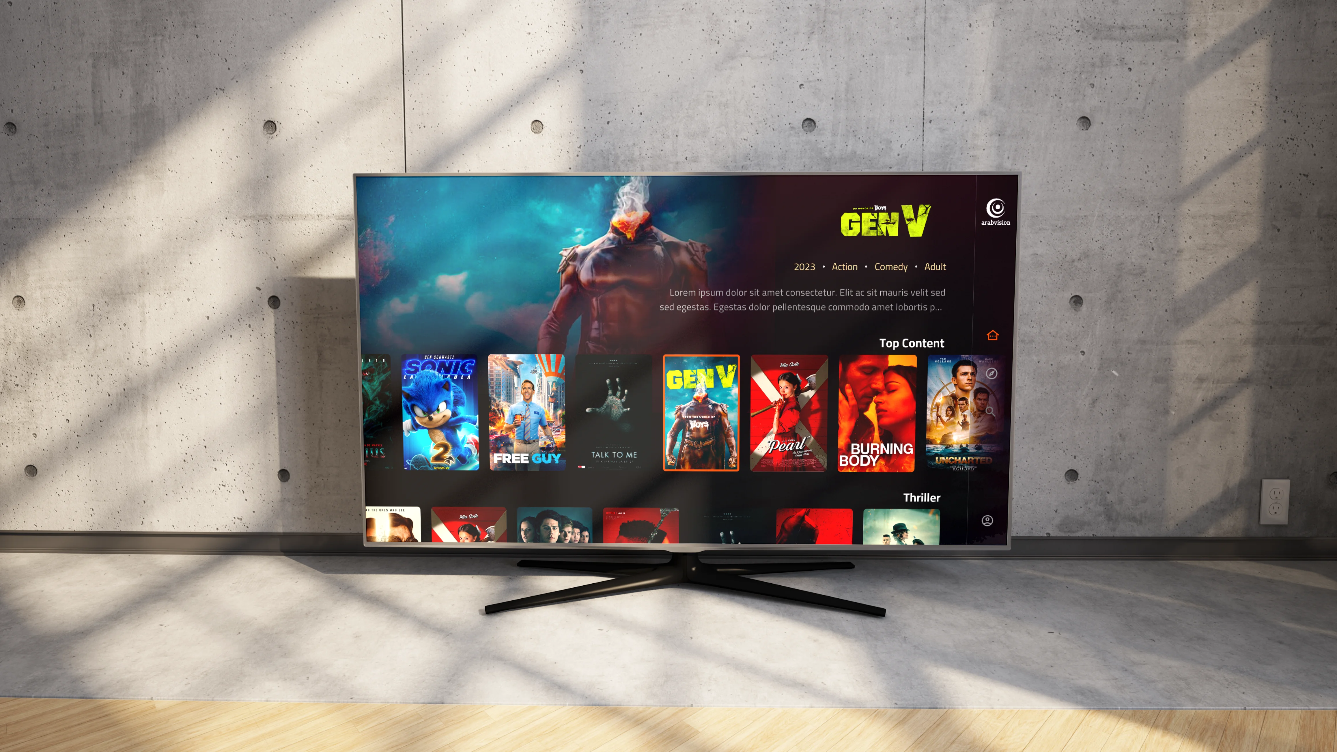 A table with a TV displaying movies.