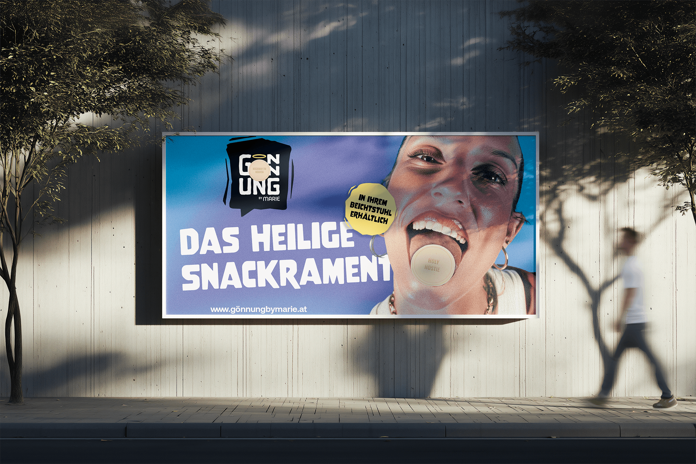 A person walks past a colorful billboard displaying bold text and graphics in an urban setting.