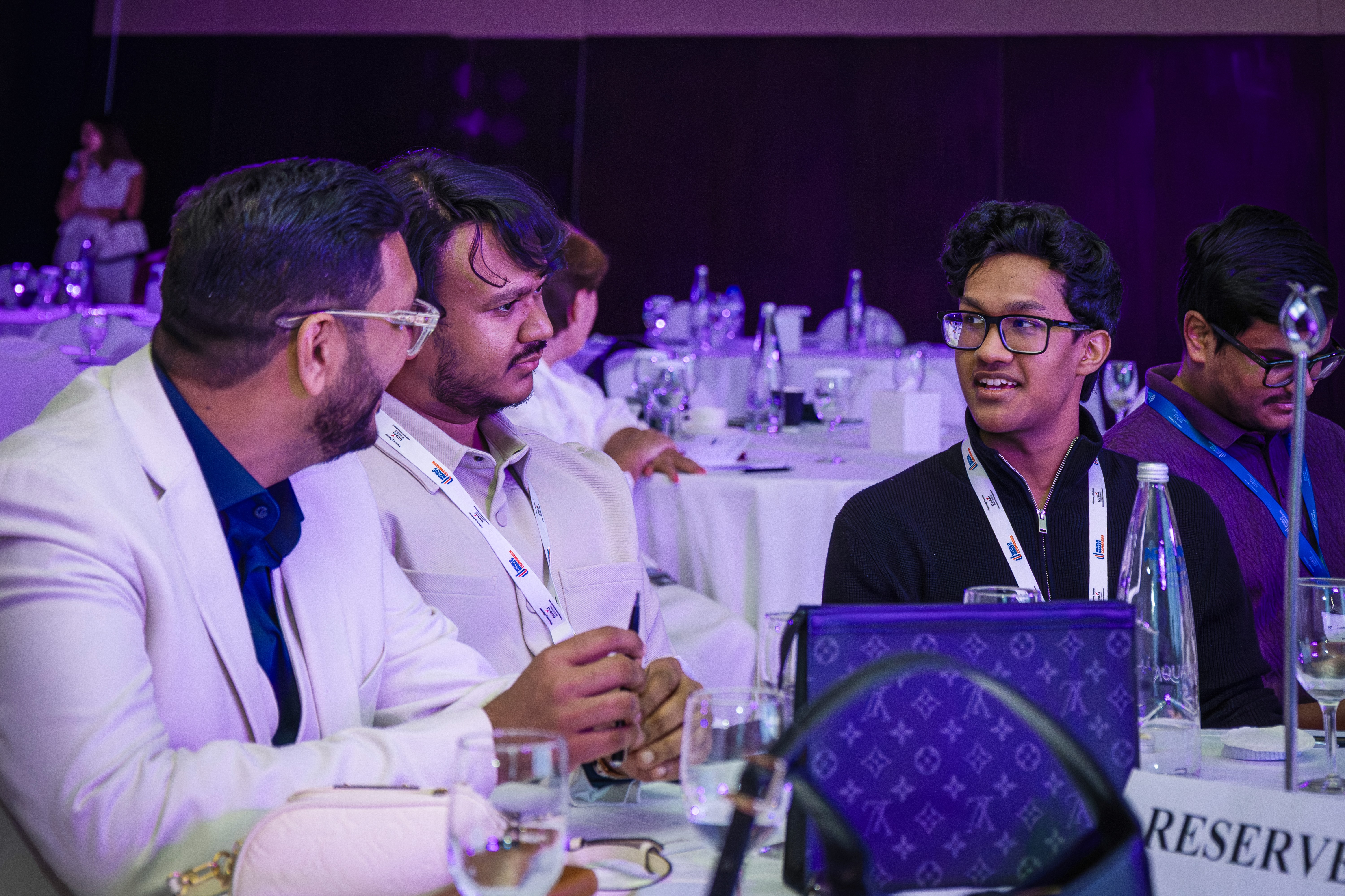 Foudners of rechitta talking to each other in the World Realty Congress