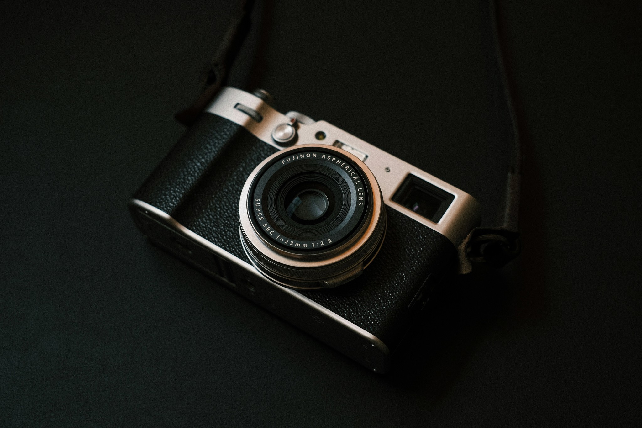 a camera sitting on top of a black table