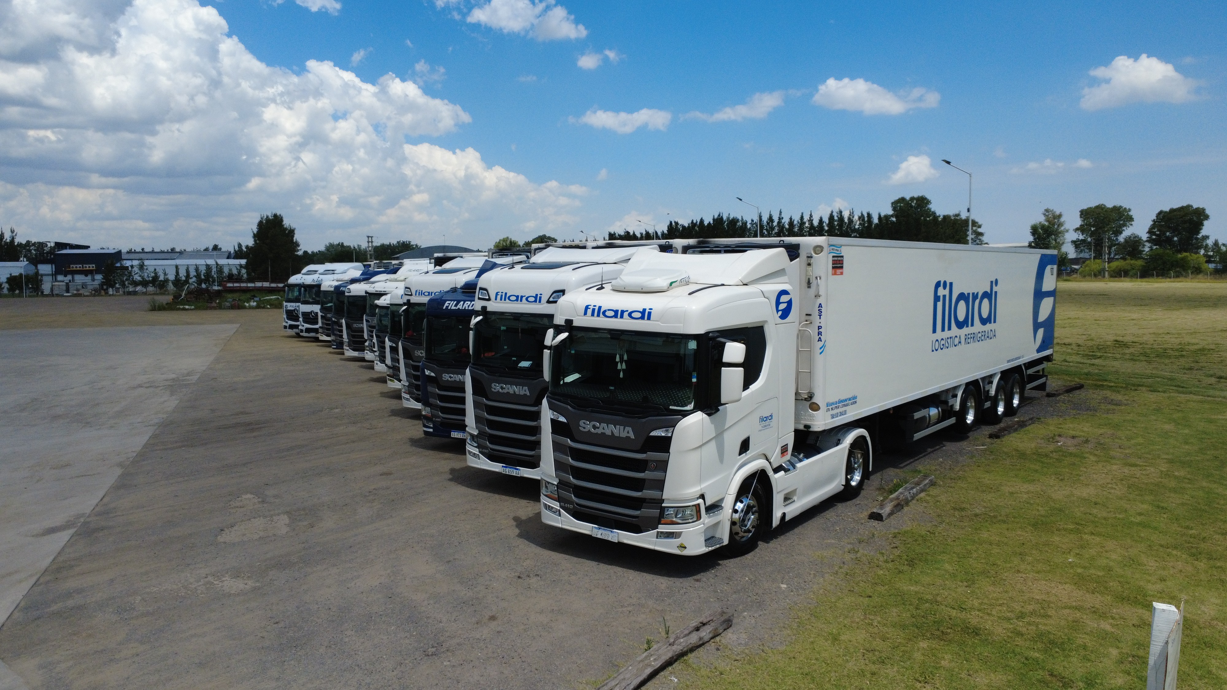 two ladies looking at a laptop and smiling