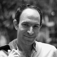 woman in white crew neck shirt smiling