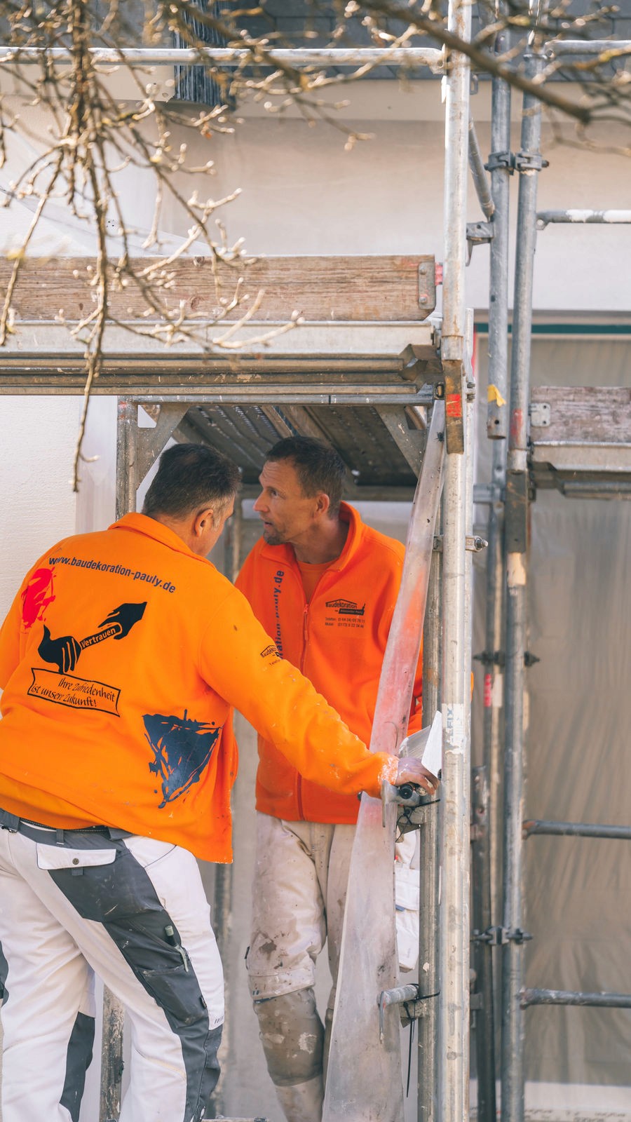 person sitting in a chair in front of a man