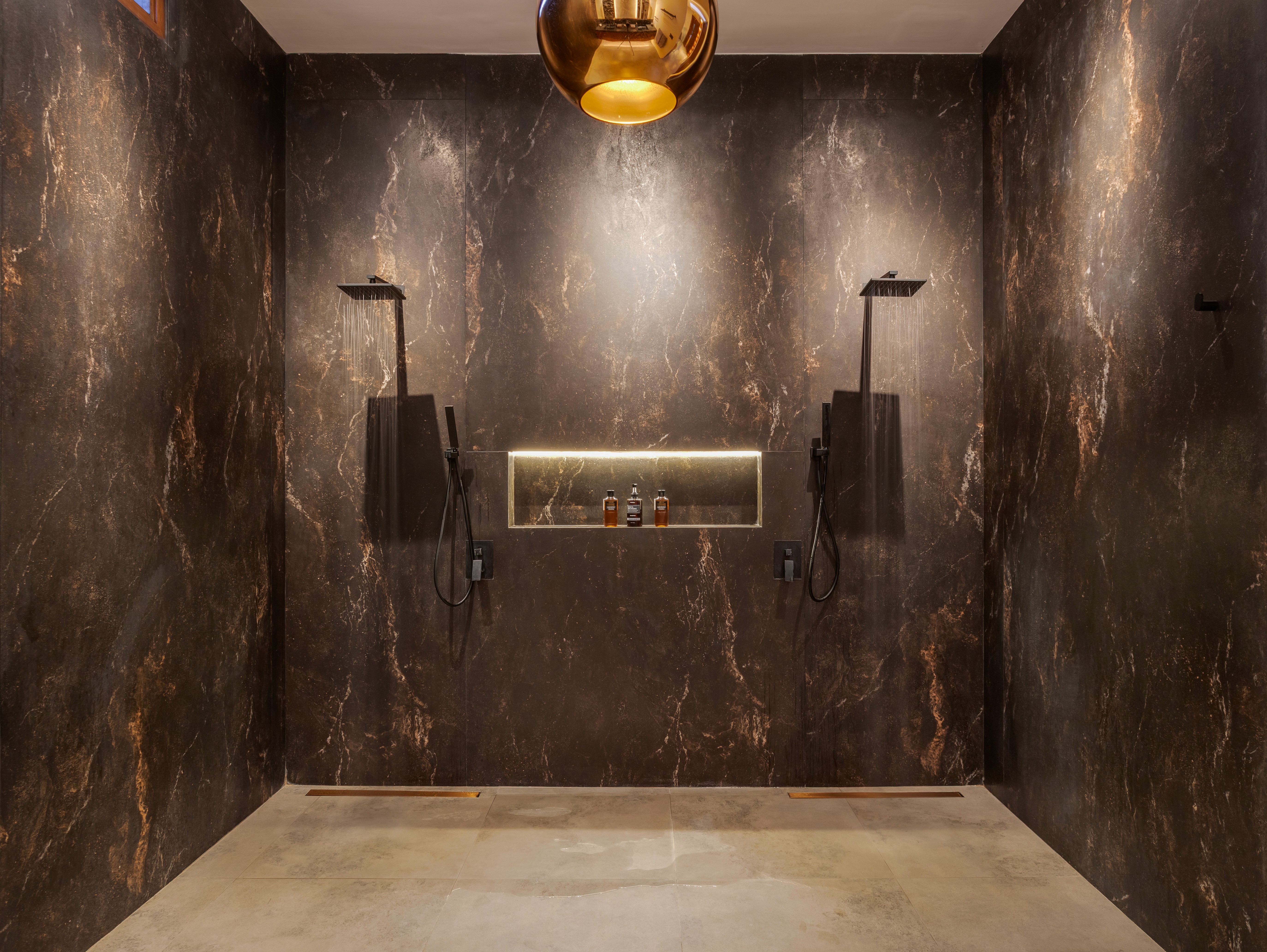 Dining area with red chairs and a view of the living room