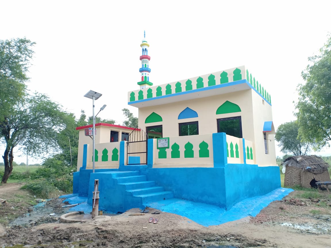 woman in gray hijab and gray coat