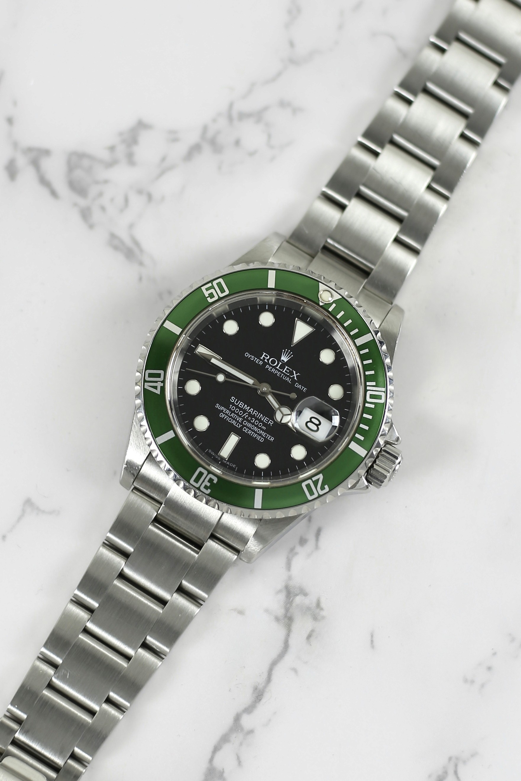 SUBMARINER DATE "KERMIT" GREEN BEZEL + RSC DISCONTINUED