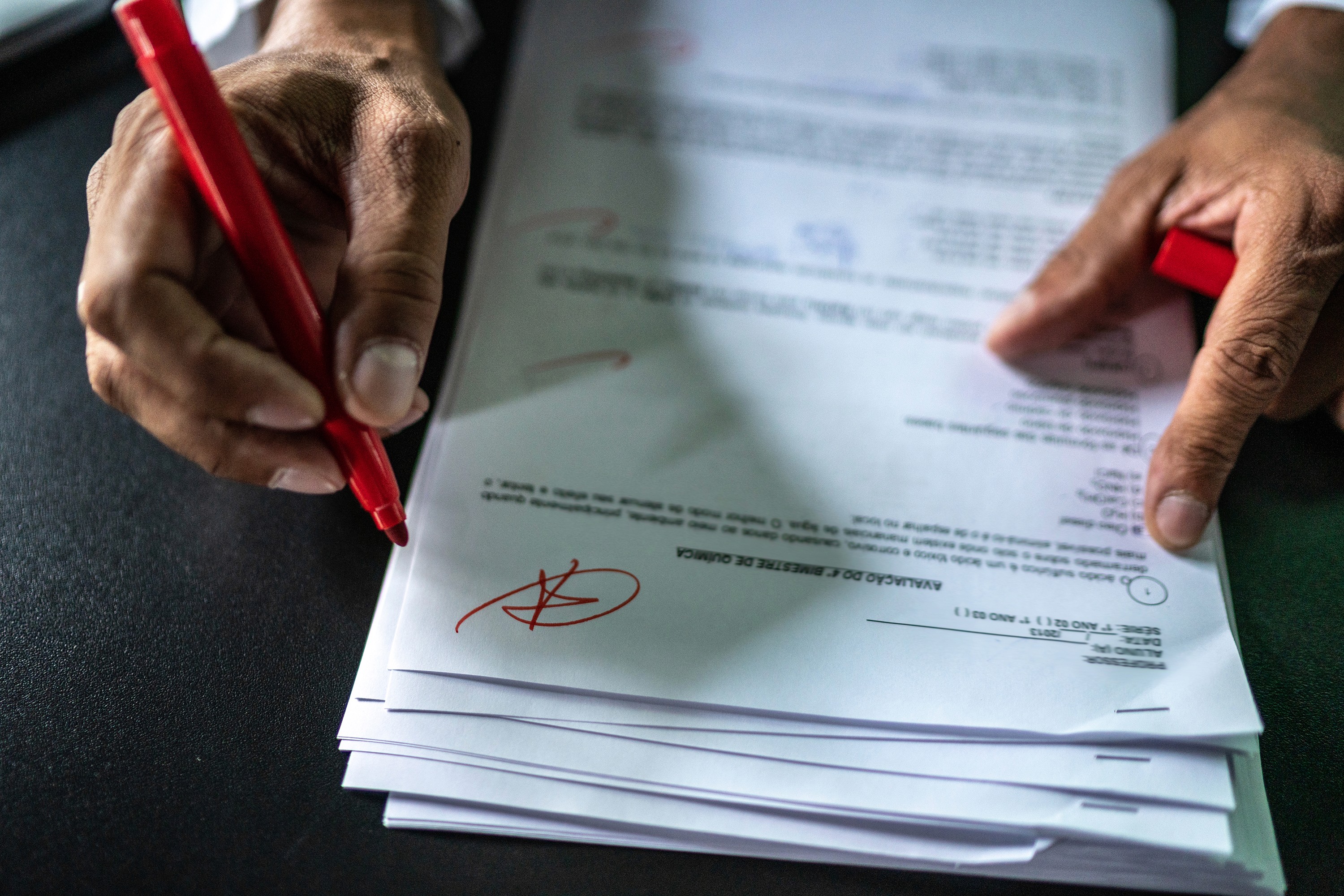 Person grading papers