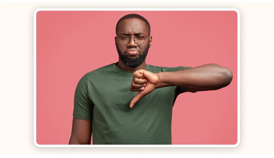 A man with thumbs down