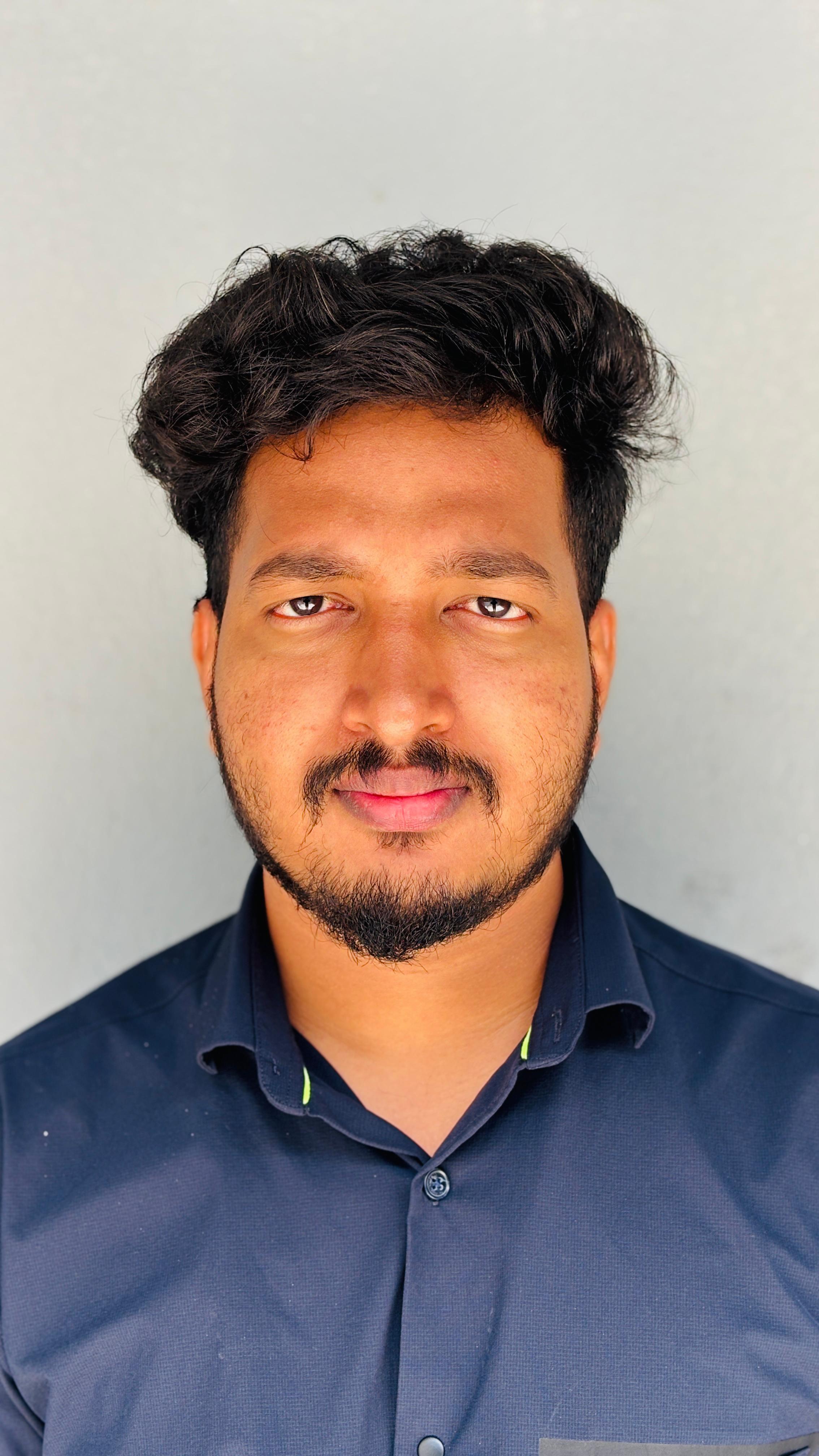 a blurry photo of a person standing in front of a wall