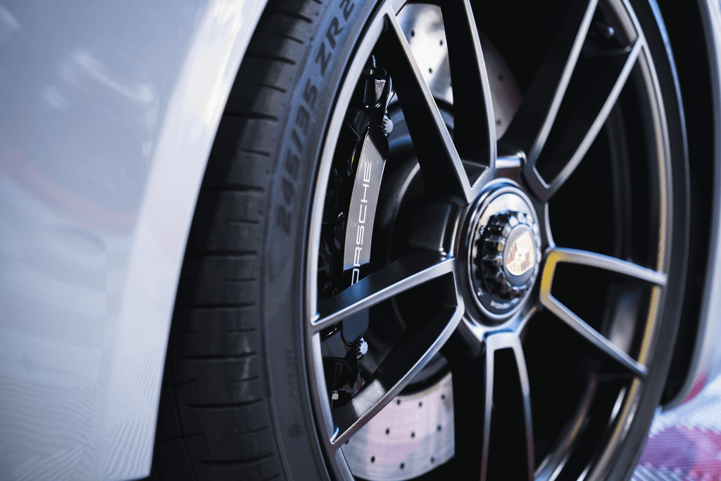 a man working on a car in a garage