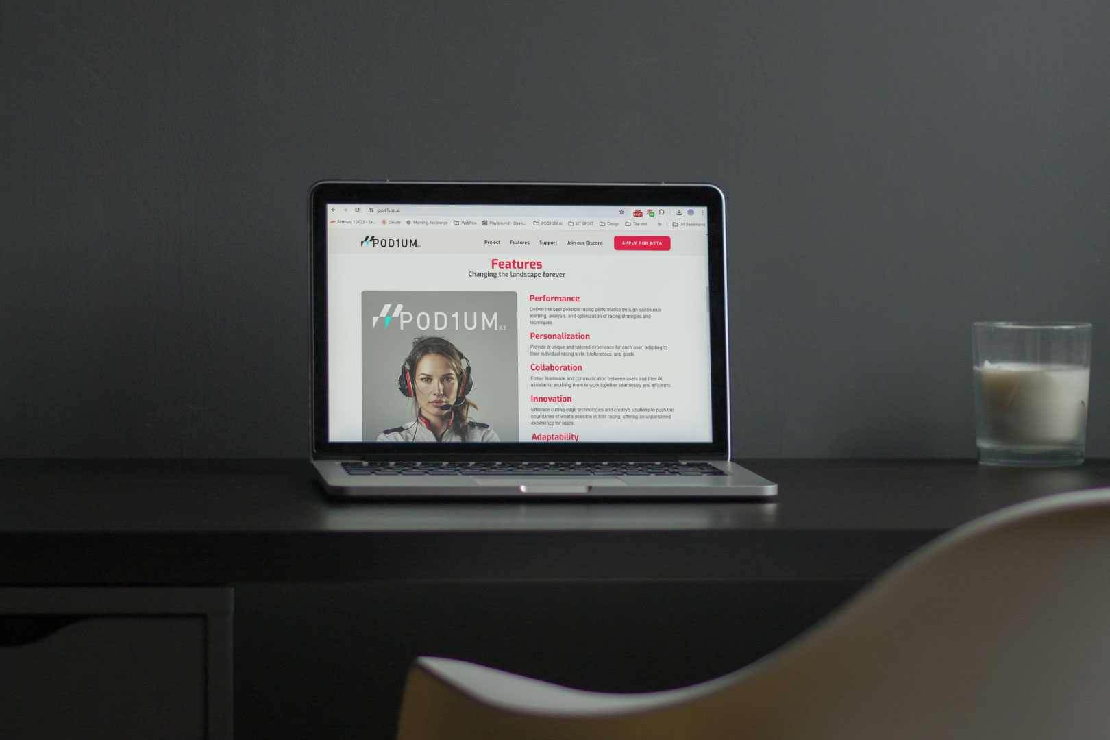 Laptop with website of Pod1um ai