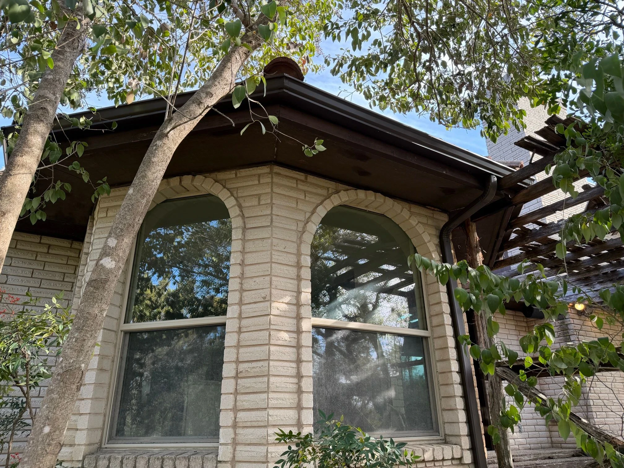 Finished repair: fascia repair beneath a tile roof in Helotes, Texas.