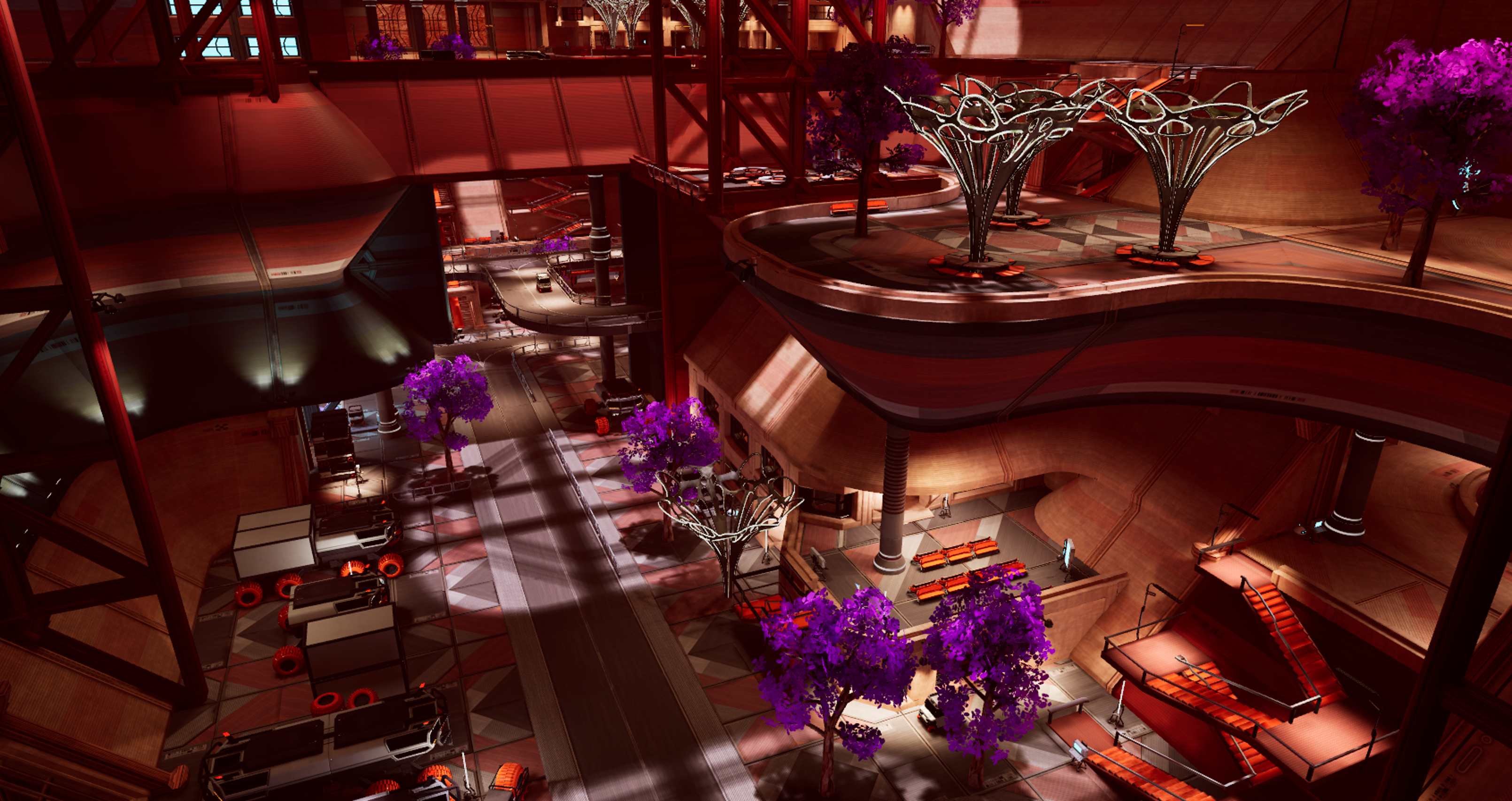 Black and white image of people working at a table with laptops, showing hands gesturing during discussion of digital content displayed on screens, with fabrica® logo in the corner.