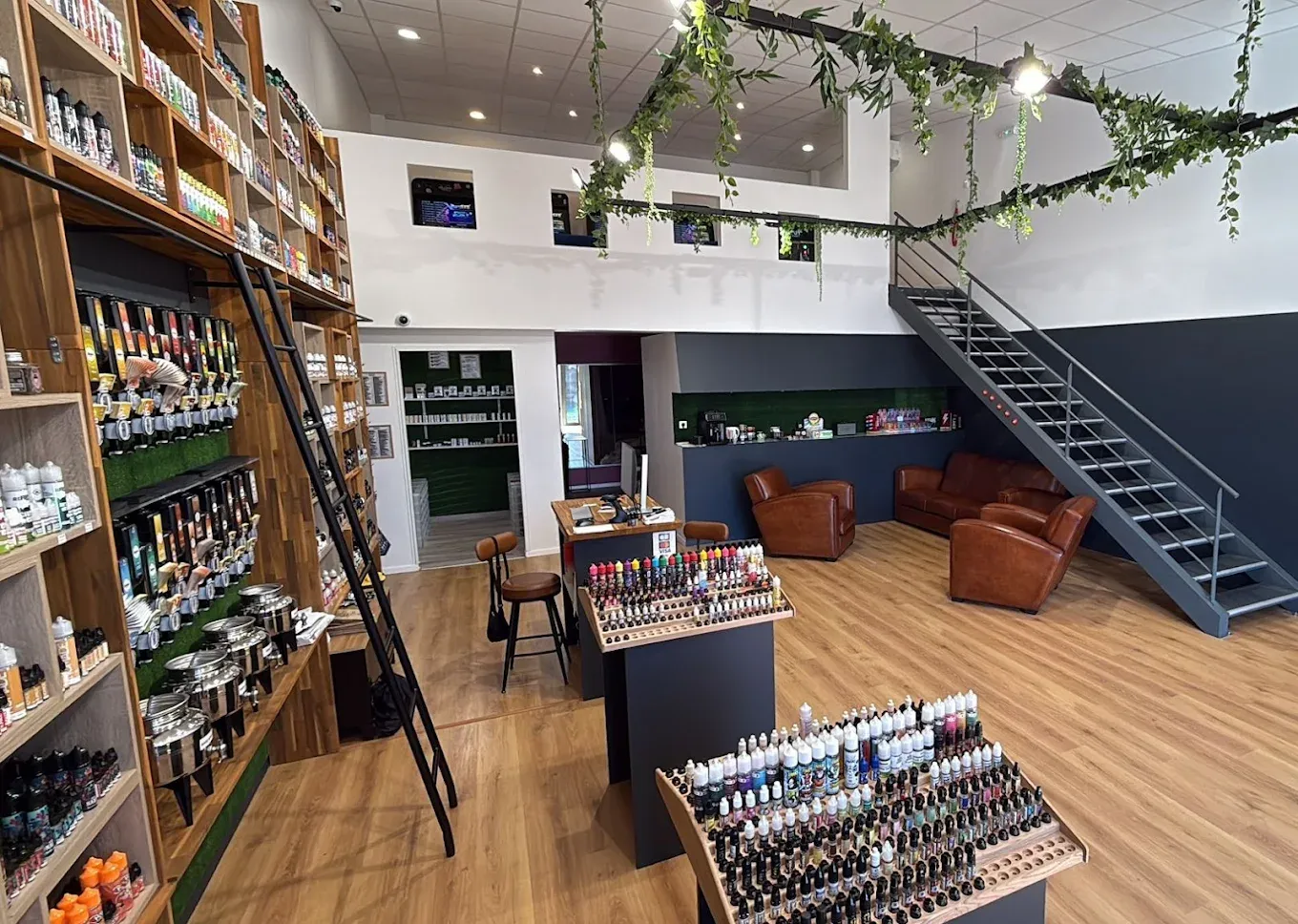 man in black crew neck shirt using macbook