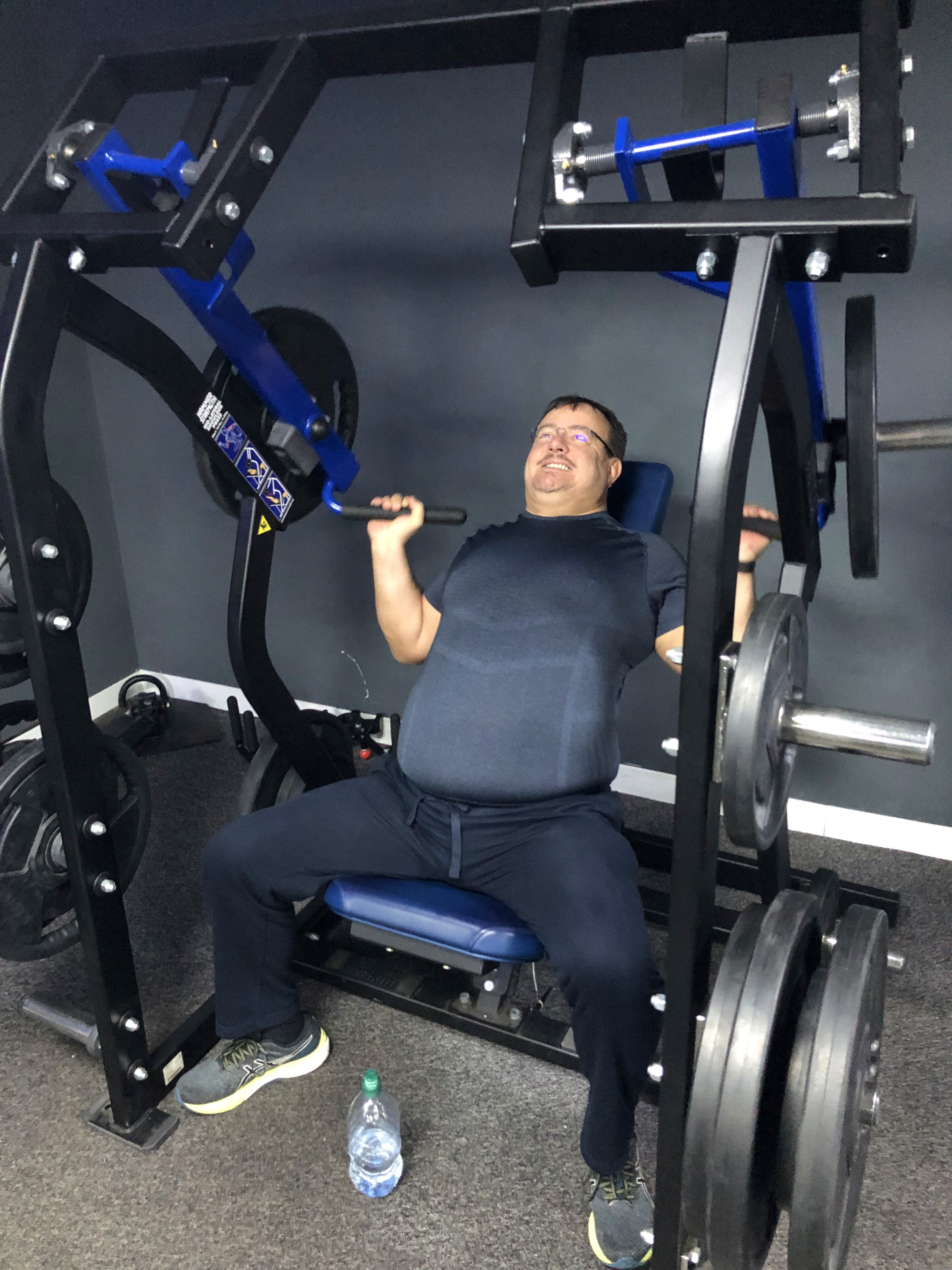 Strength training in a dark gym