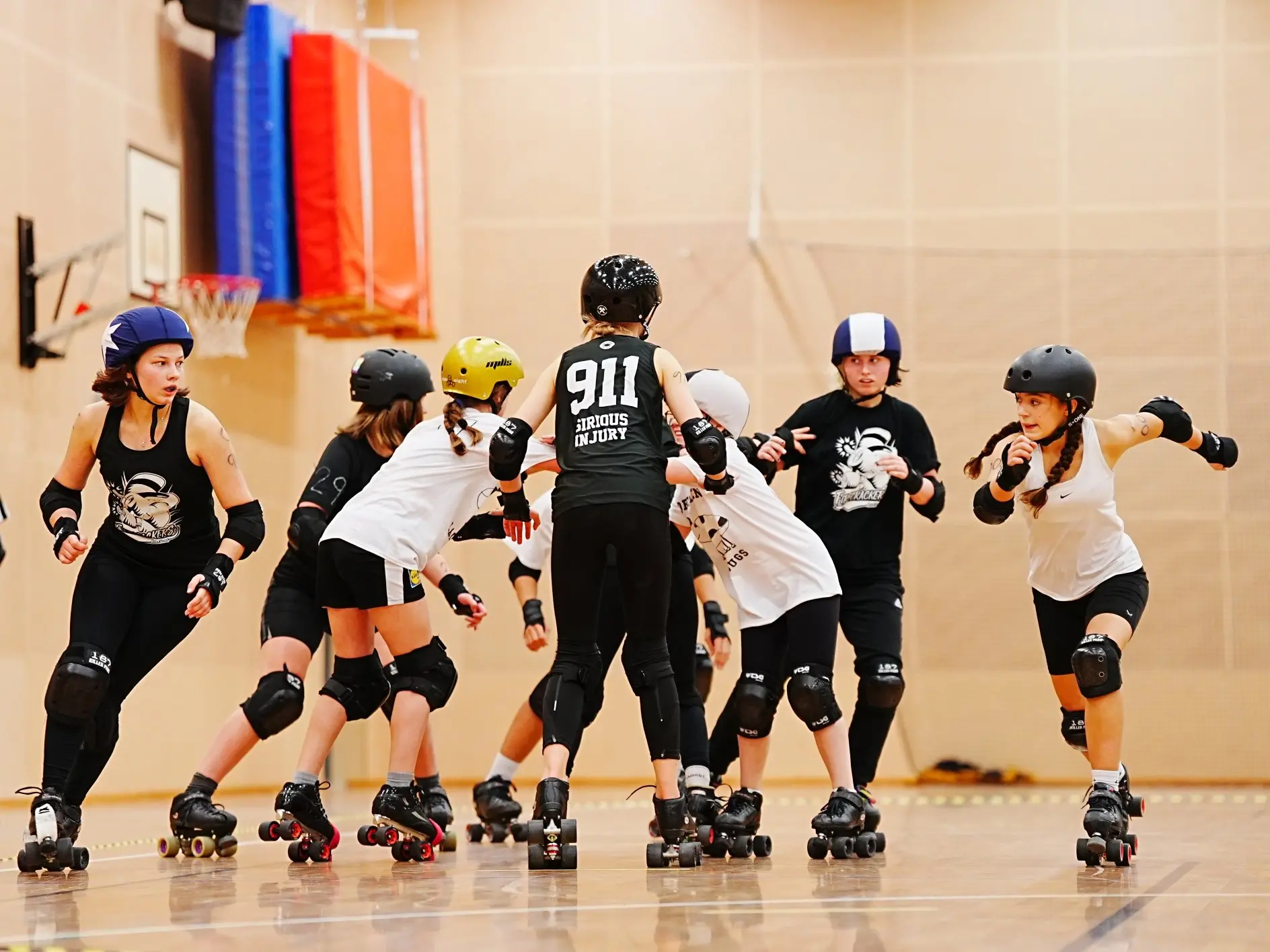 A roller derby player skating.