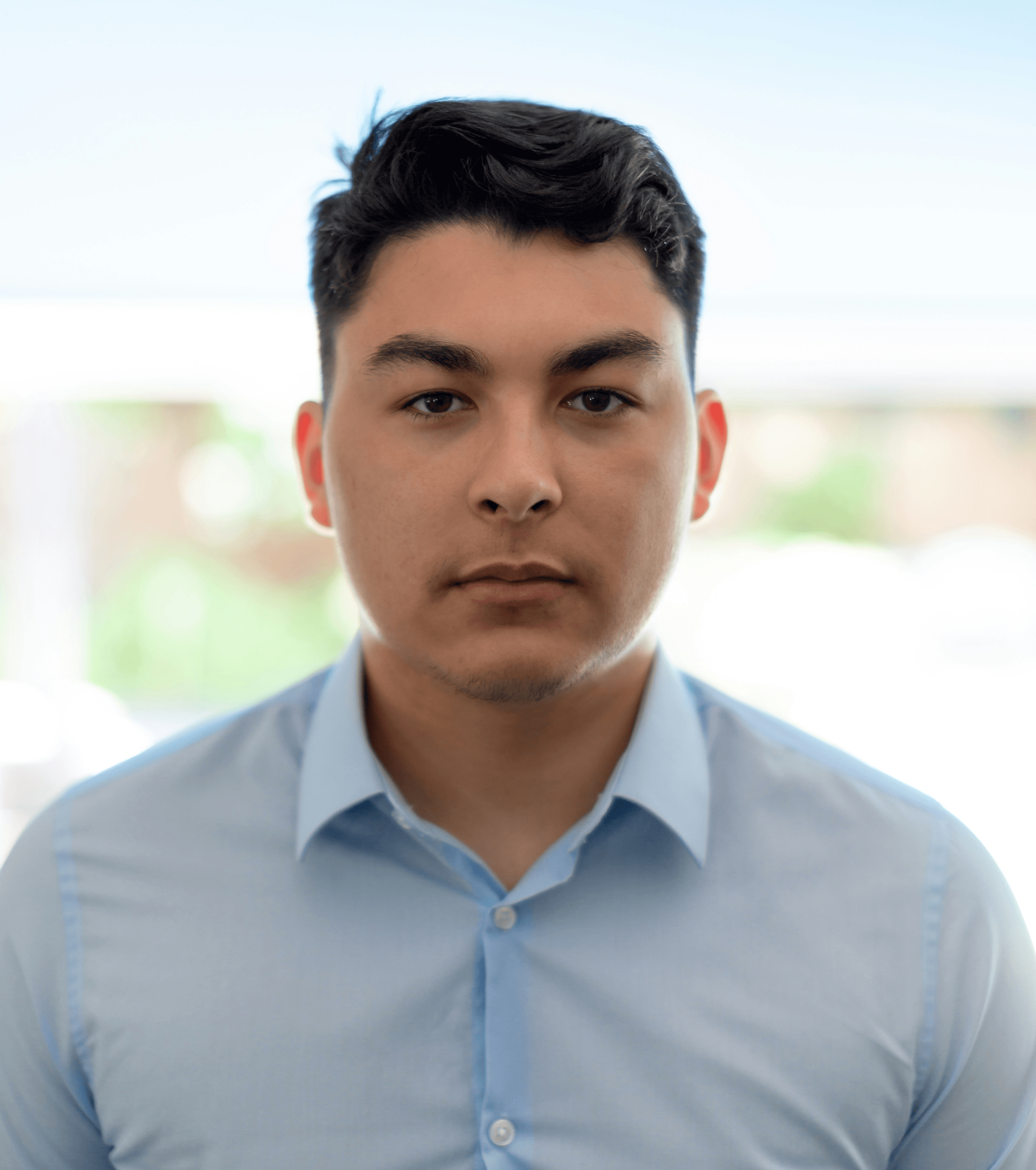 man in blue dress shirt