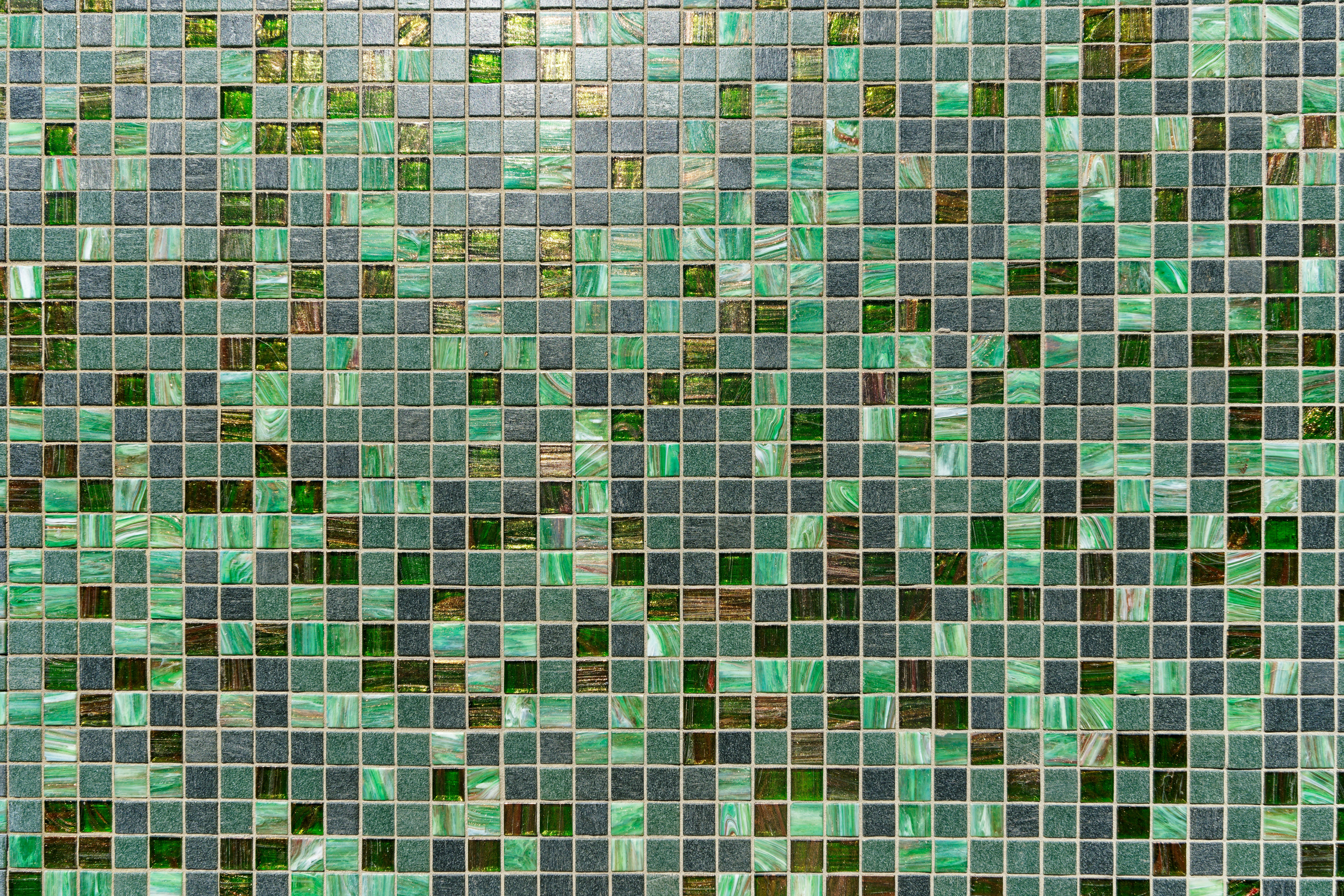 Close-up of ceramic and glass tiles used in a modern shower