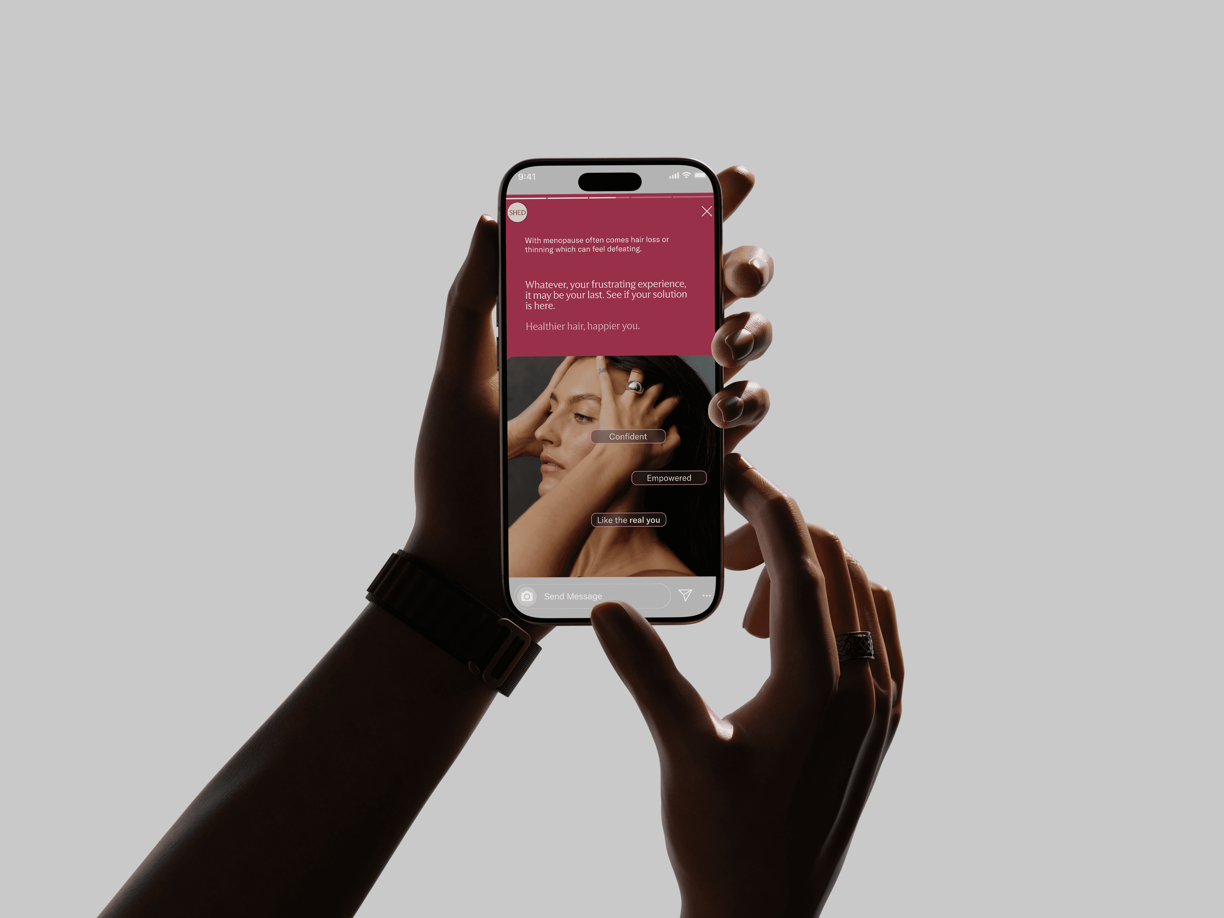 A person holds a smartphone displaying a social media post about hair care