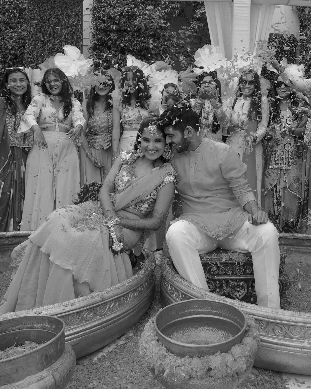 girl in white dress holding bouquet of flowers