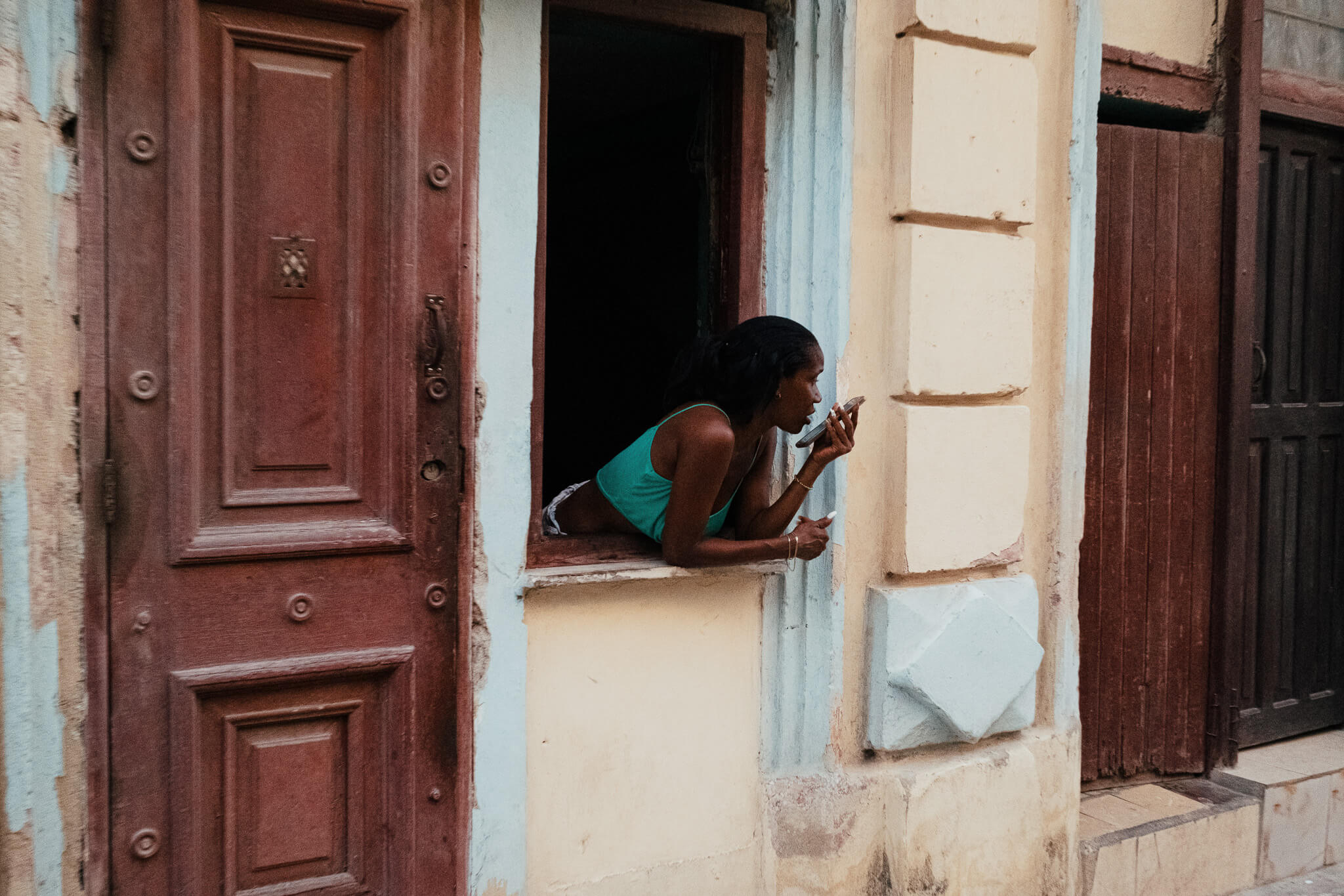 GIRL TALKING ON HER PHONE